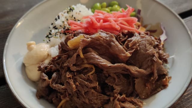 Beef bowl - thin cut beef, boiled in gyudon fond with onions and ginger. - Makoto Bento, Stockholm