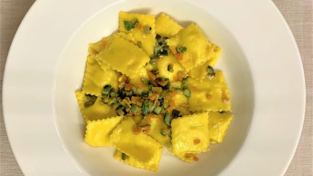 Ravioli ripieni di spigola ,sogliole , ricotta e piccole verdure    - Protti