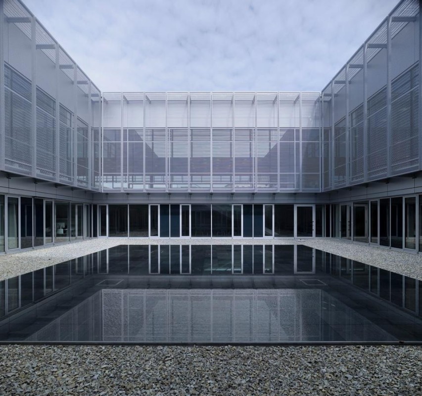 Inside, few divisions and a small inner courtyard with a little black water basin. Nothing elevates the building from being just a simple enclosure for its contents.
