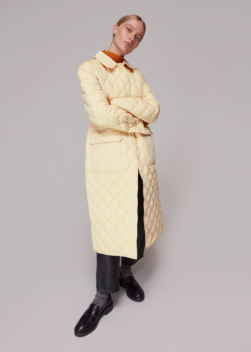 Pale yellow coat store