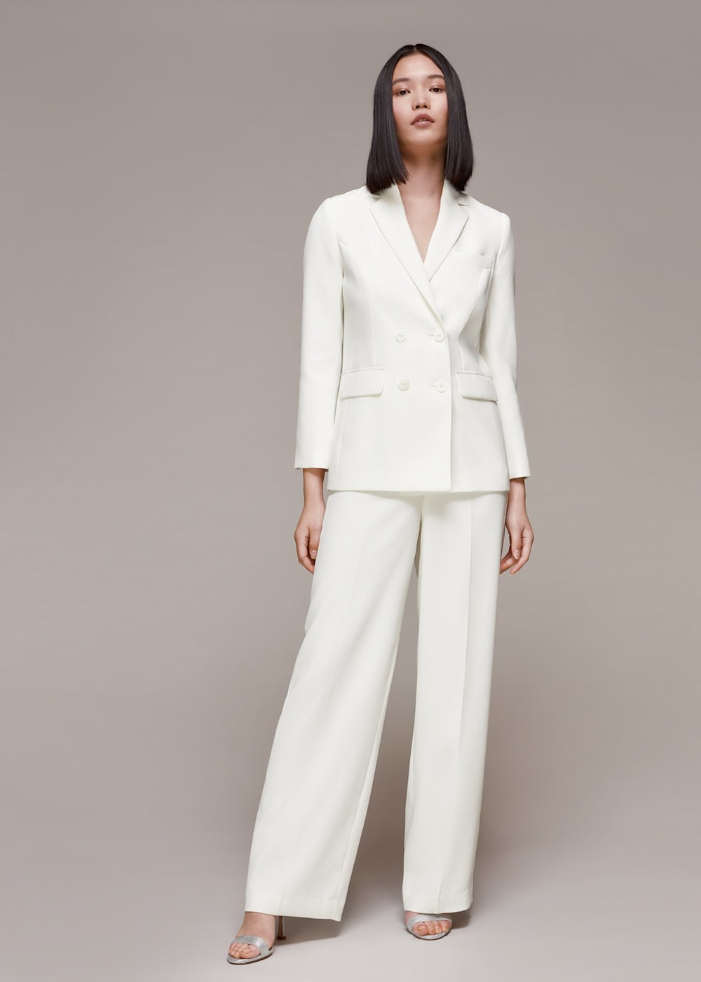 Ladies cream trouser suit for a wedding sales
