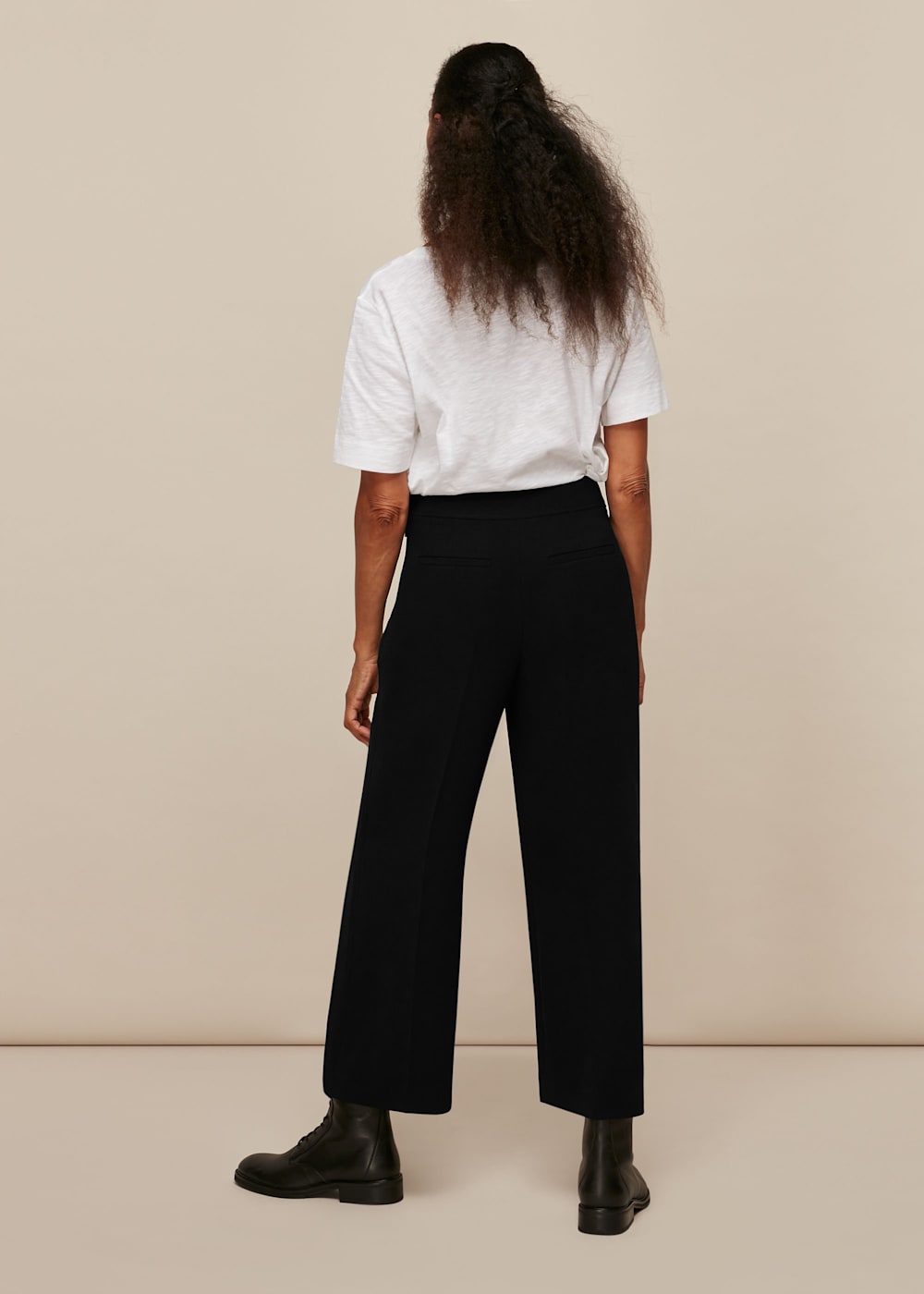 Cropped black wide leg trousers top