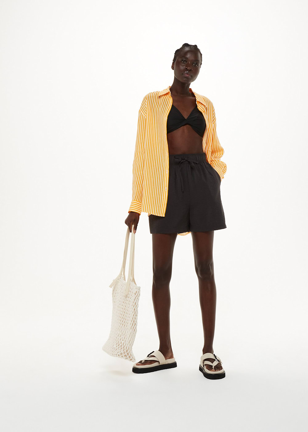 Short black elasticated skirt 2025