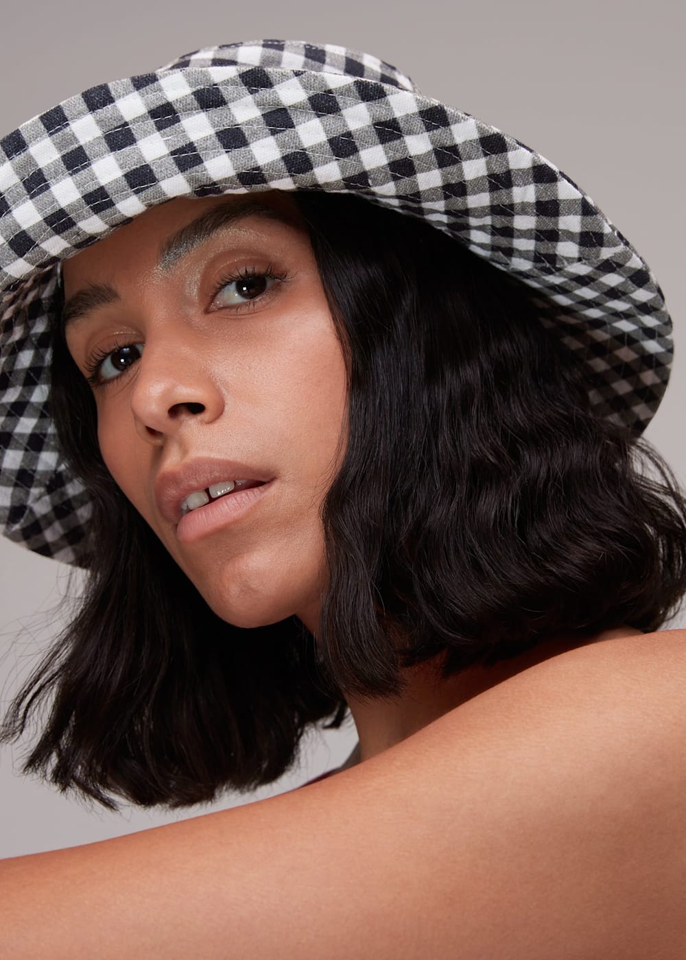 Black and white checkered bucket hat store