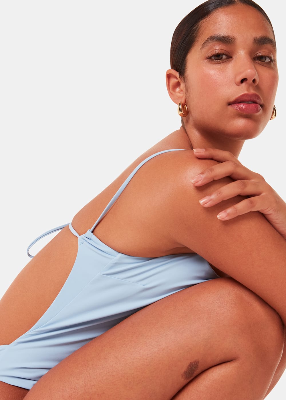 Open back swimming costume deals