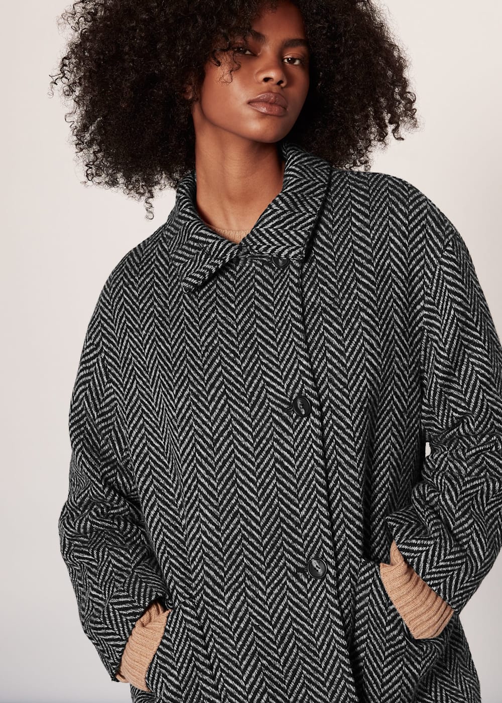 Black and white herringbone coat shop
