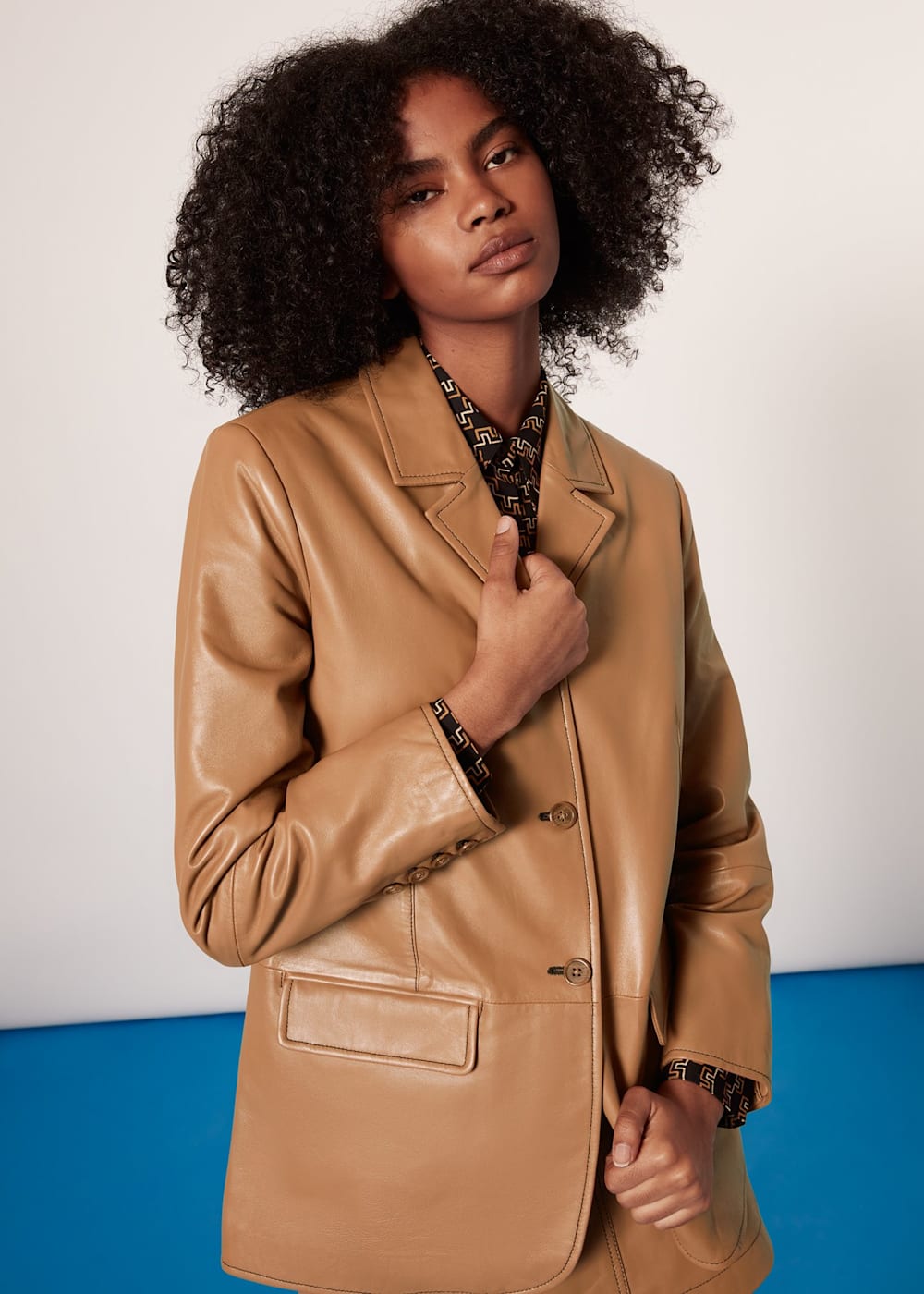 Neutral leather jacket clearance