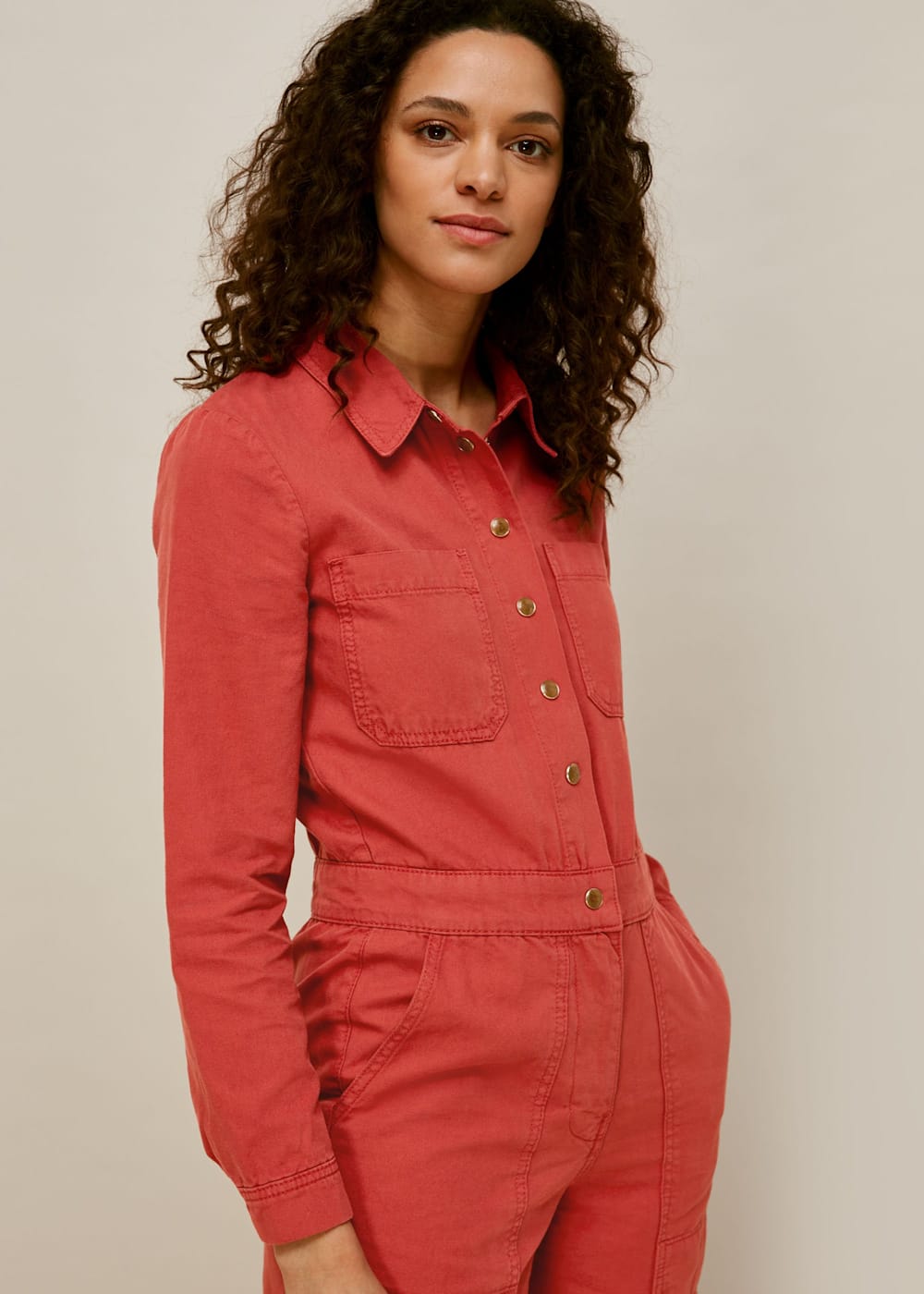 Orange denim jumpsuit sales