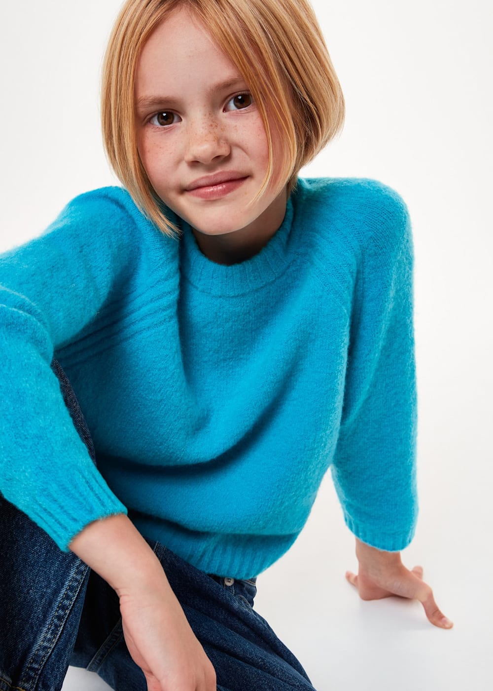 Turquoise blue jumper top