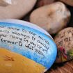 Withdrawing life sustaining treatment painted pebbles