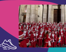 A photo of hundred of people dressed as Santa in front of St Pauls
