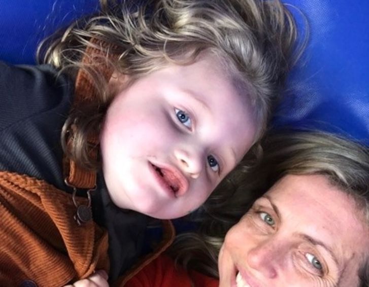 A mum takes a selfie with her daughter