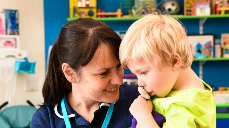 Nurse with little boy