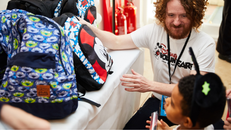 Boy choosing goodie bag