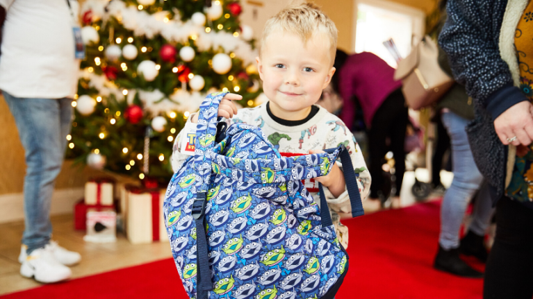 Boy with goodie bag