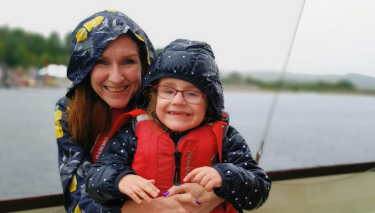 Mary and her mum on a boat