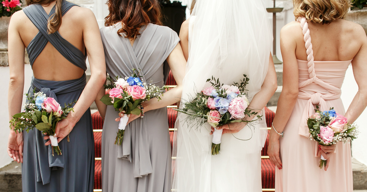 Bridesmaids in their mis-matched bridesmaid dresses Bridesmaids in their mis-matched bridesmaid dresses