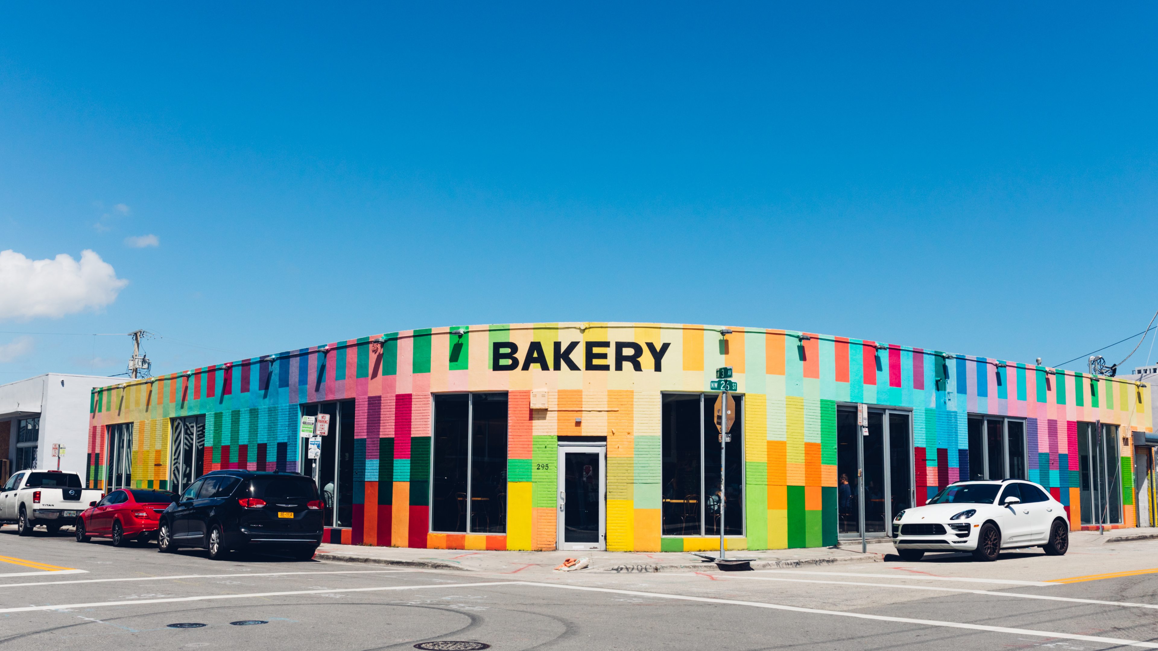 Rainbow striped exterior of bakery.