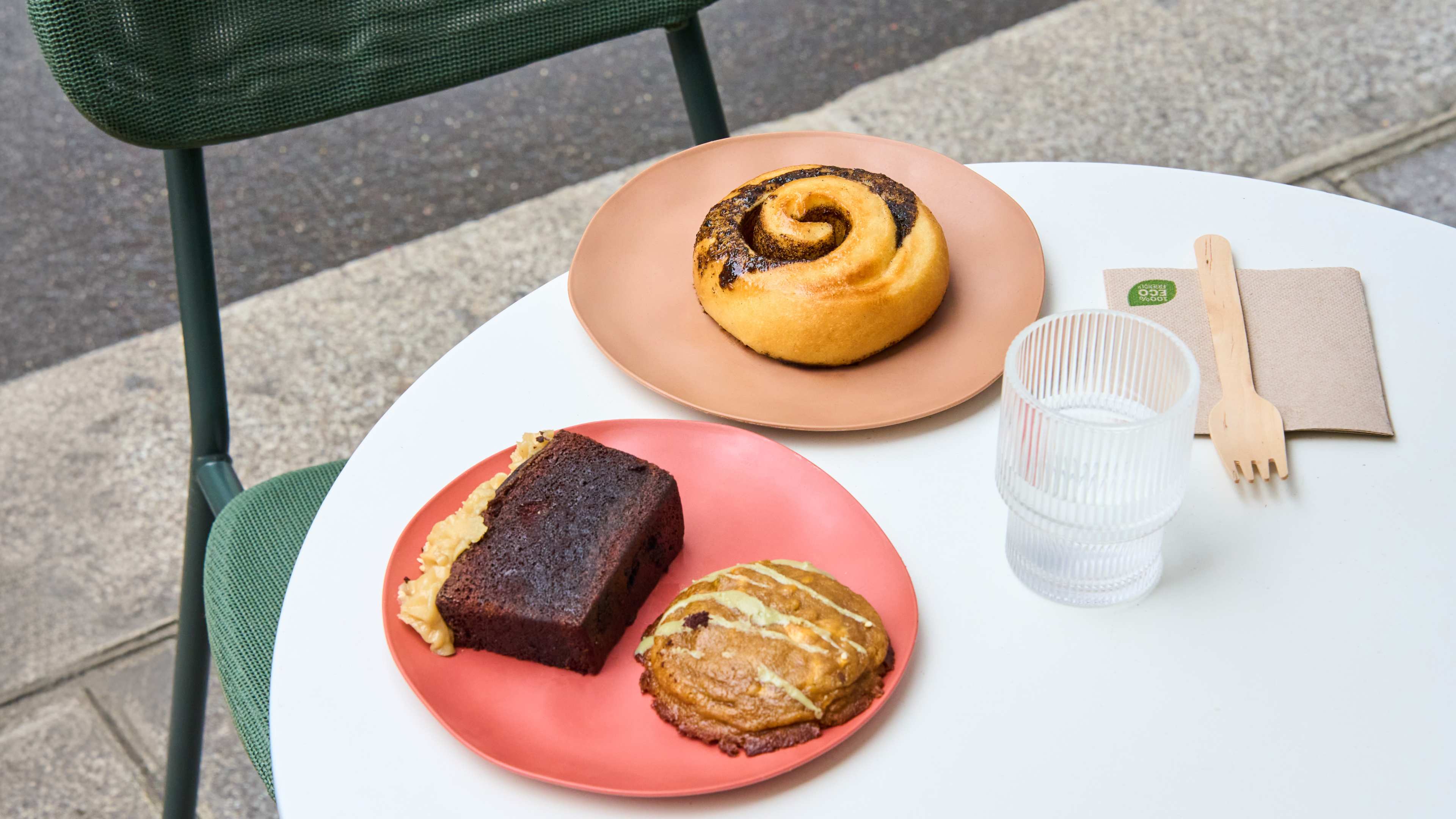 A table full of pastries on the outdoor patio of Lam in Paris.