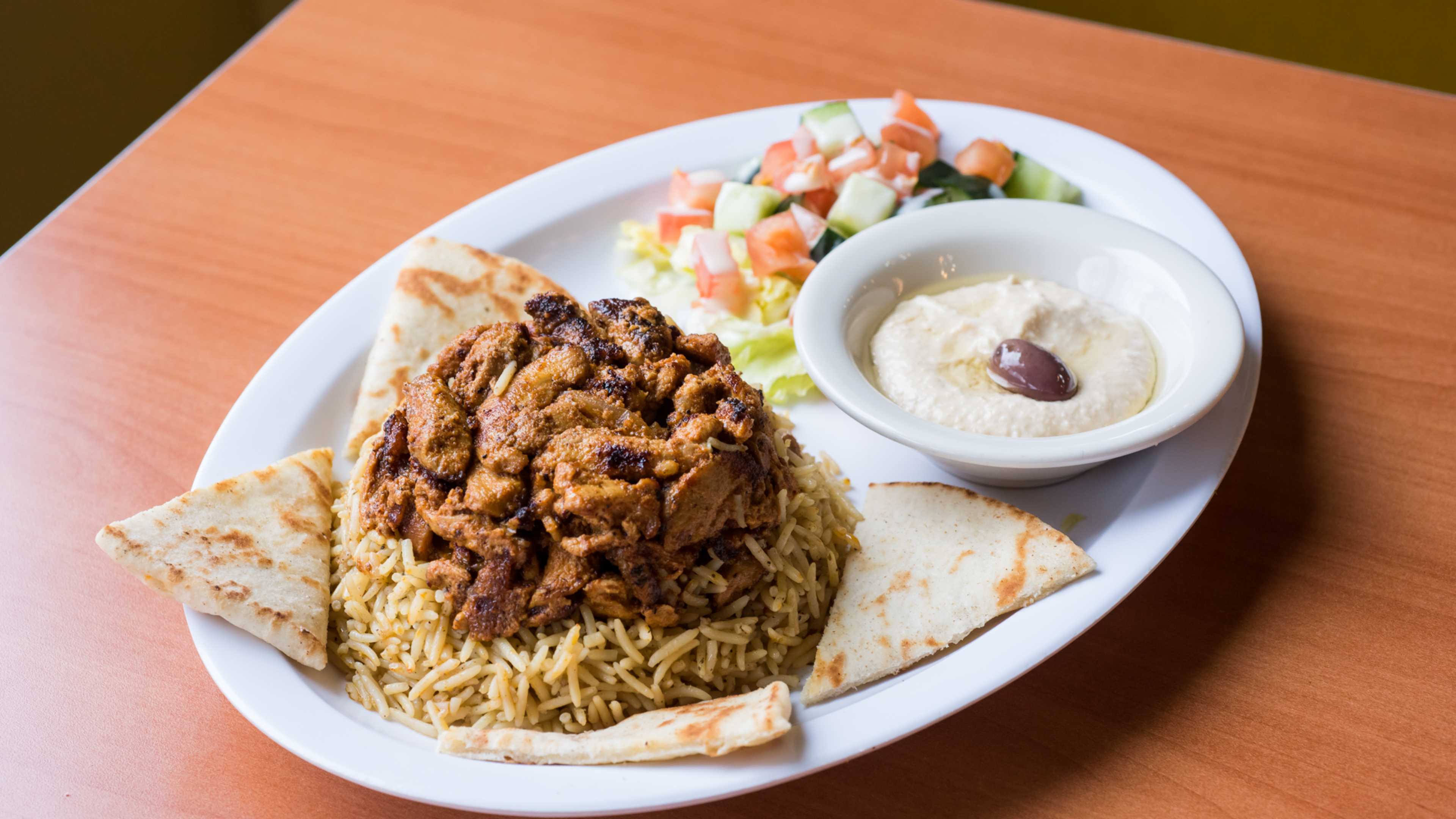 chicken shawarma plate with rice and pita