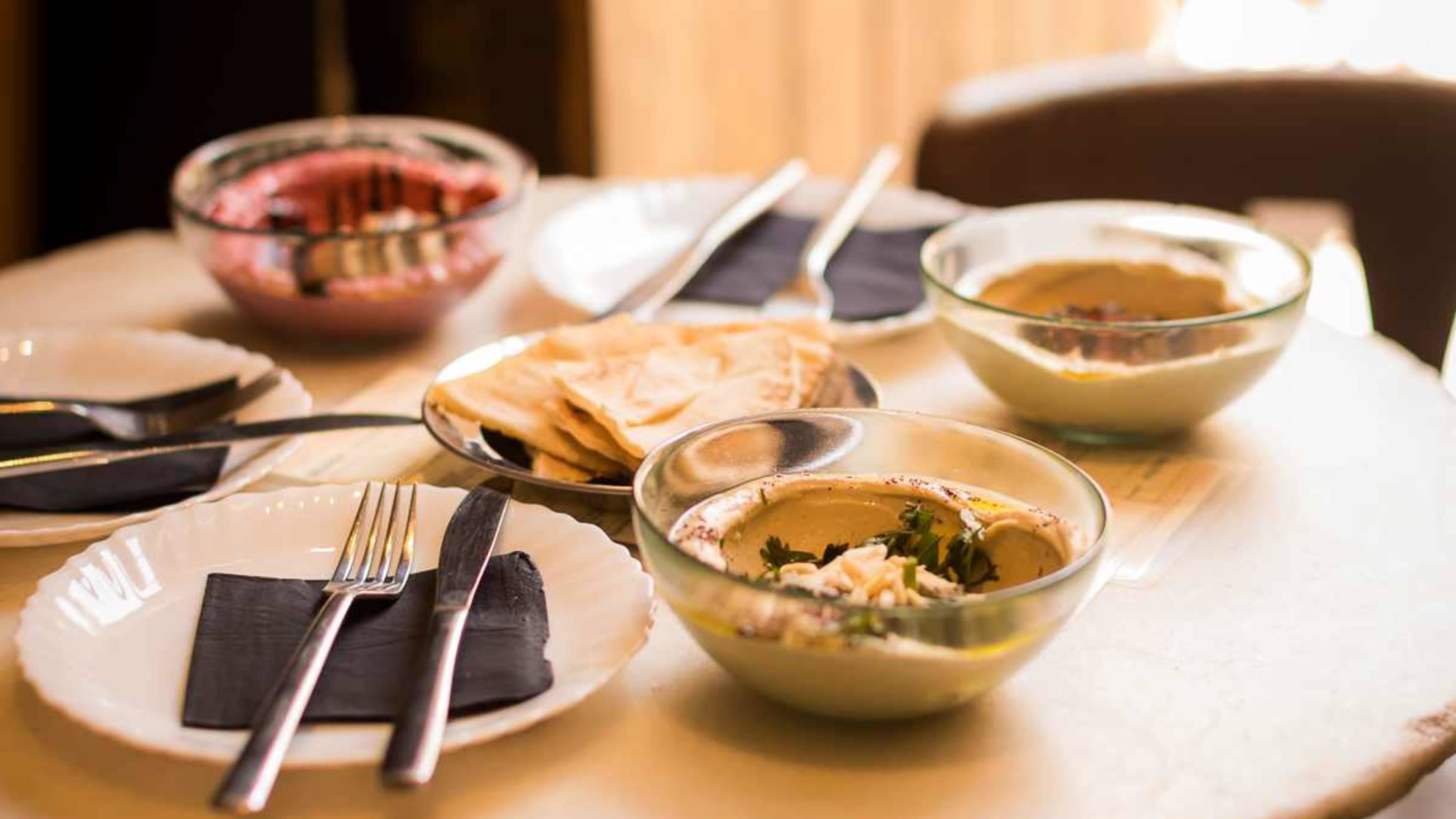 spread of lebanese dishes like hummus