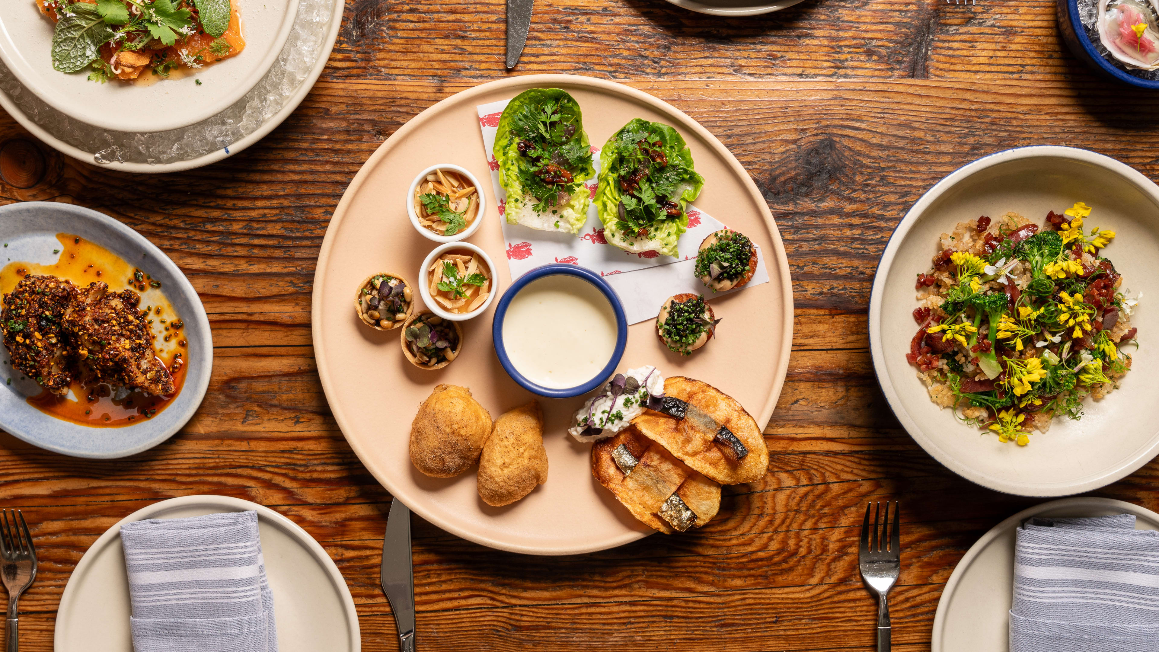 The sampler platter, fried rice, and dumplings at Rich Table