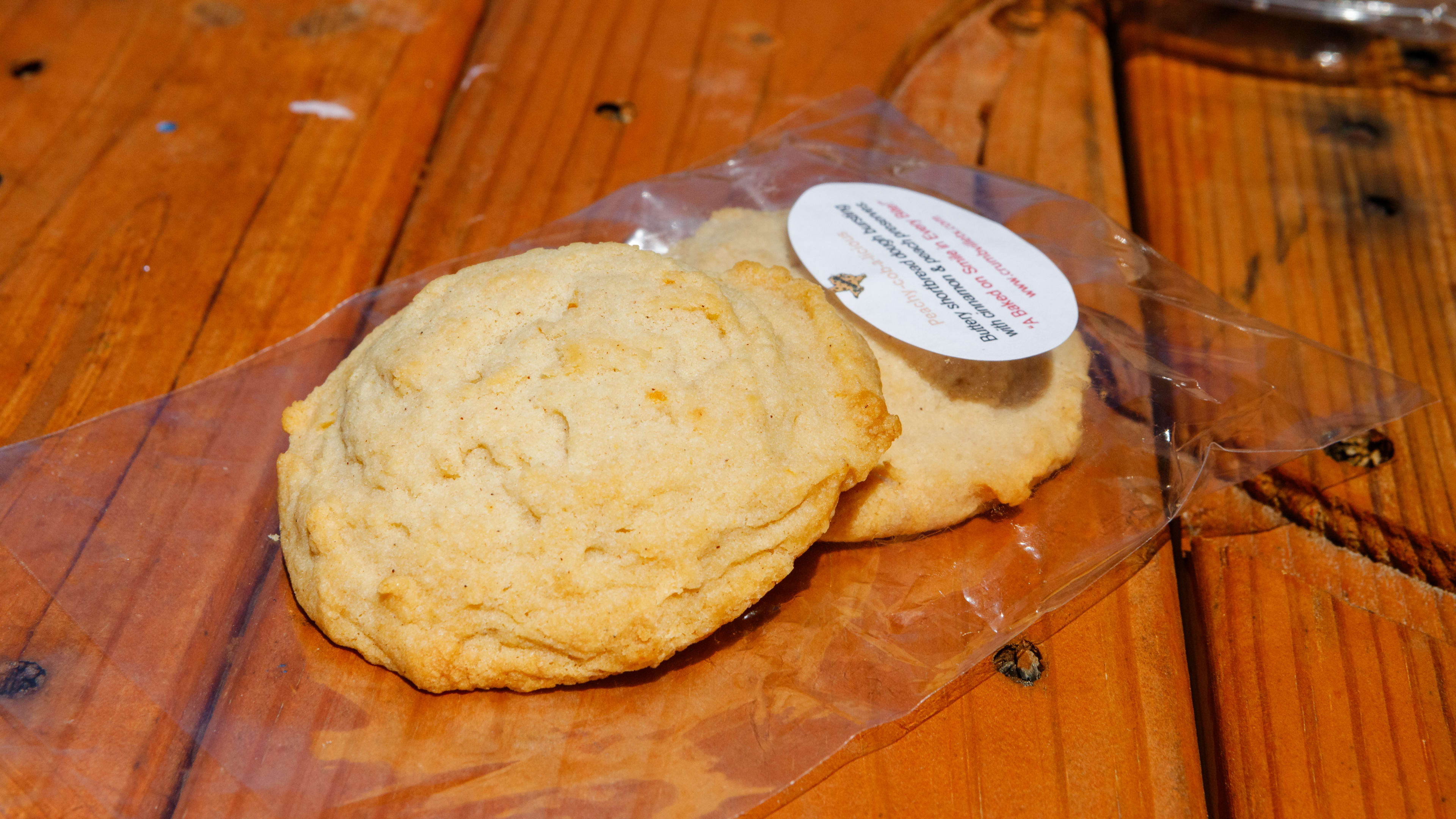 Two peach cobbler shortbread cookies from Crumbville, TX.