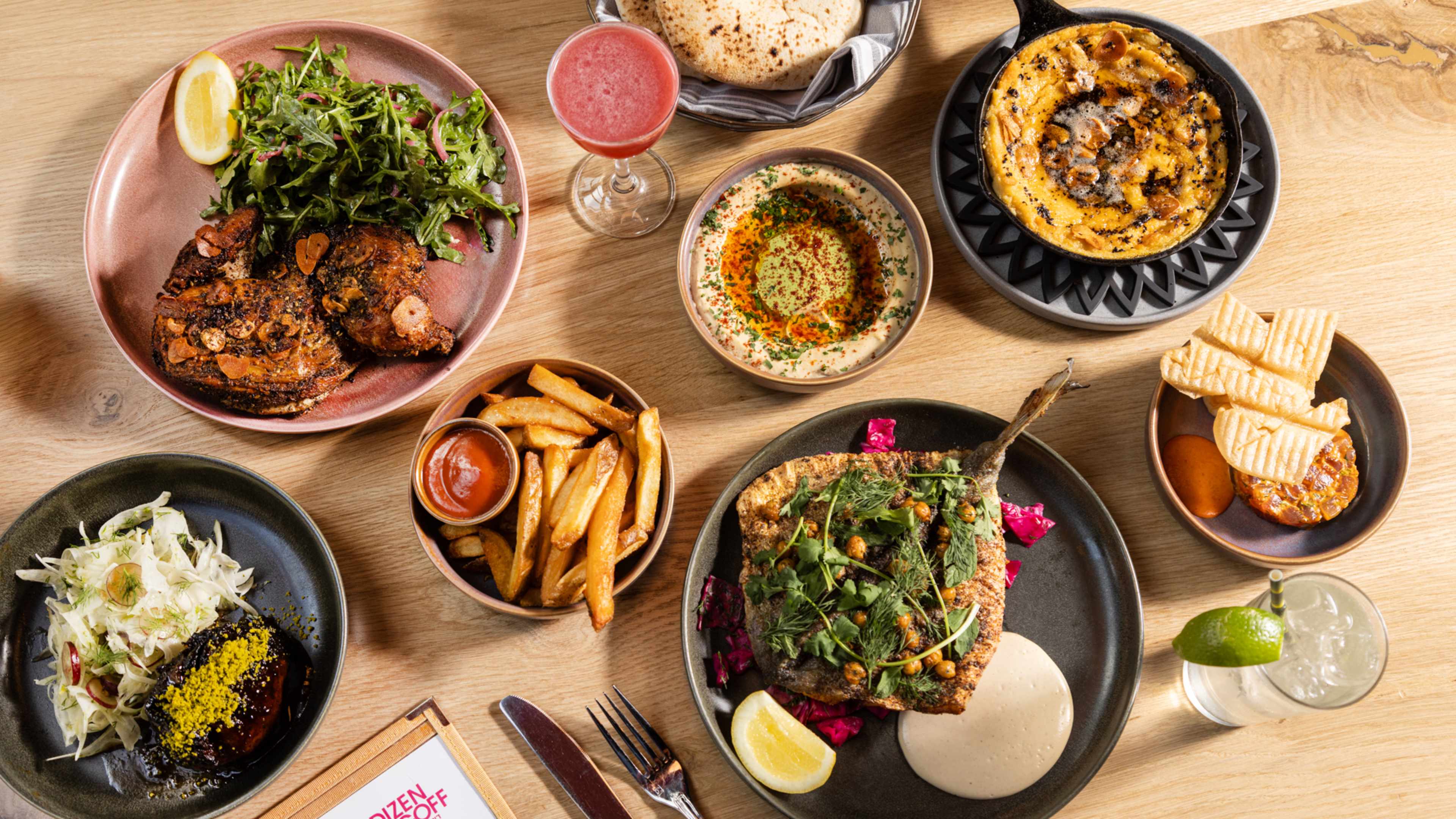 This is a food spread at Dizengoff.