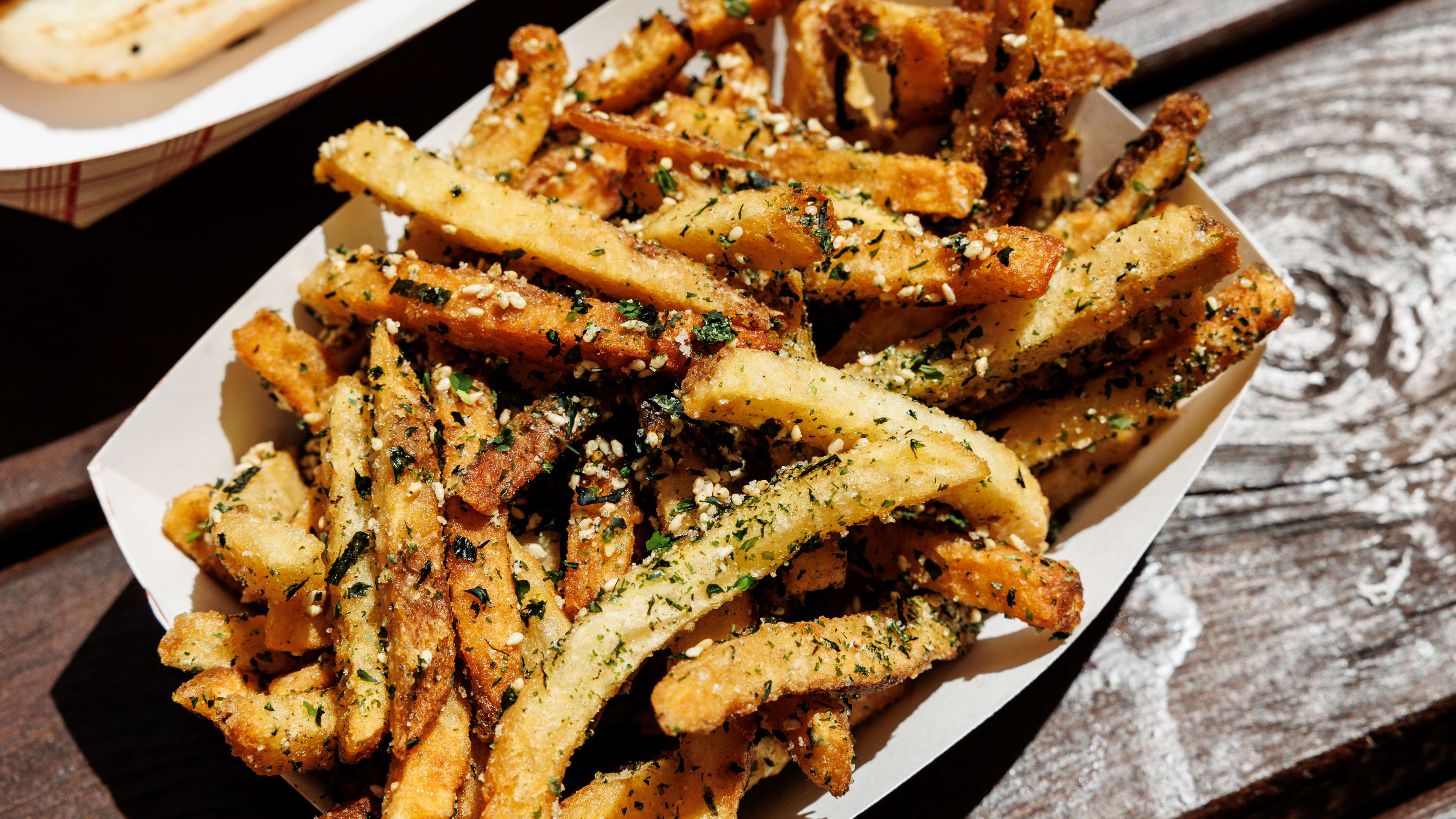 furikake topped fries in paper tray