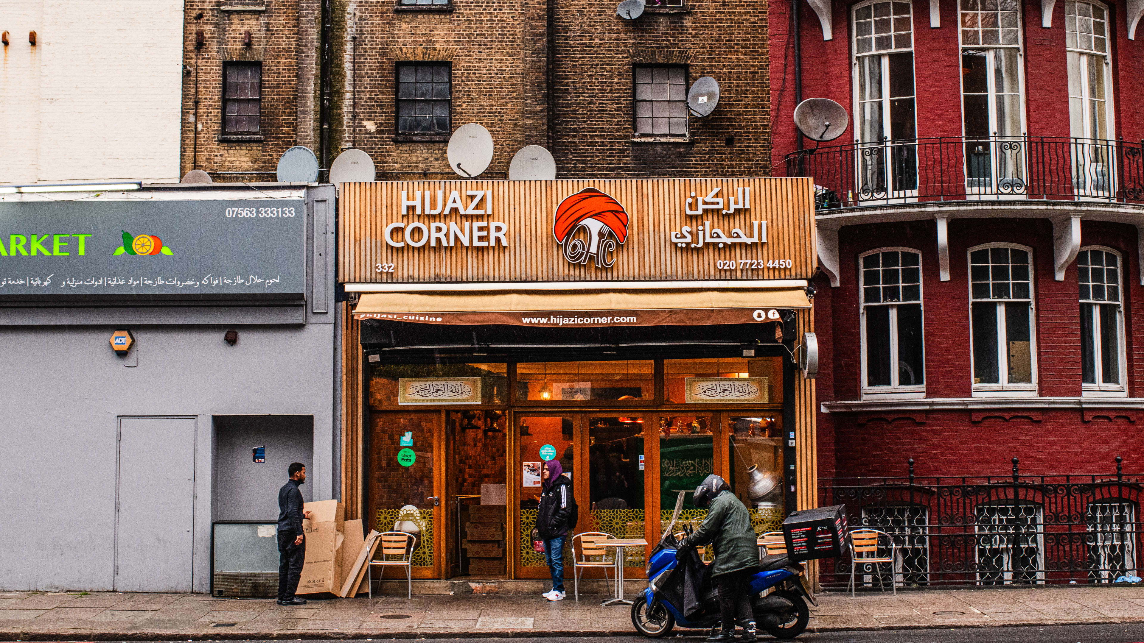 Exterior of restaurant with "Hijaazi Corner' signage.