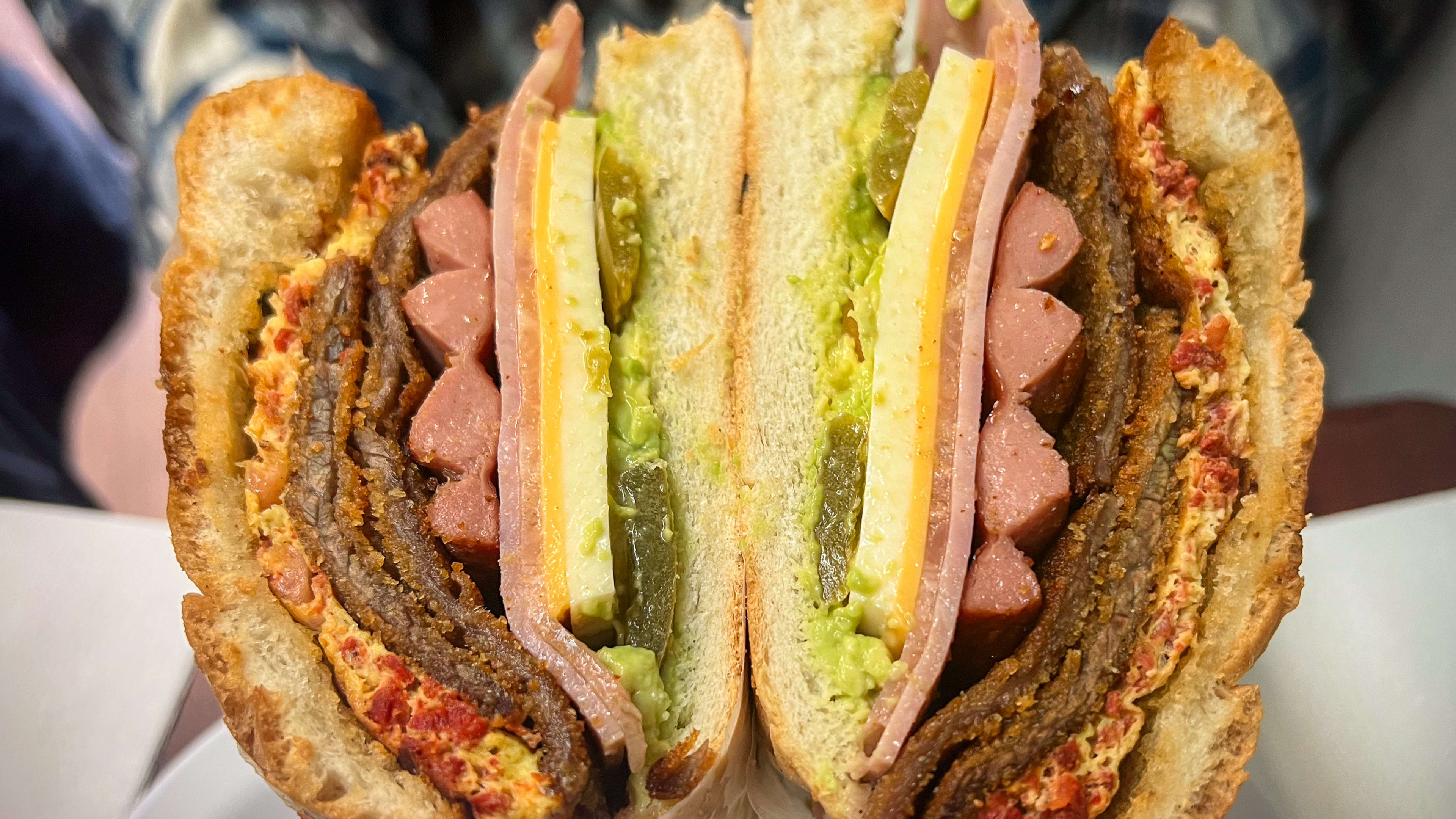 a torta Cubana cut in half.