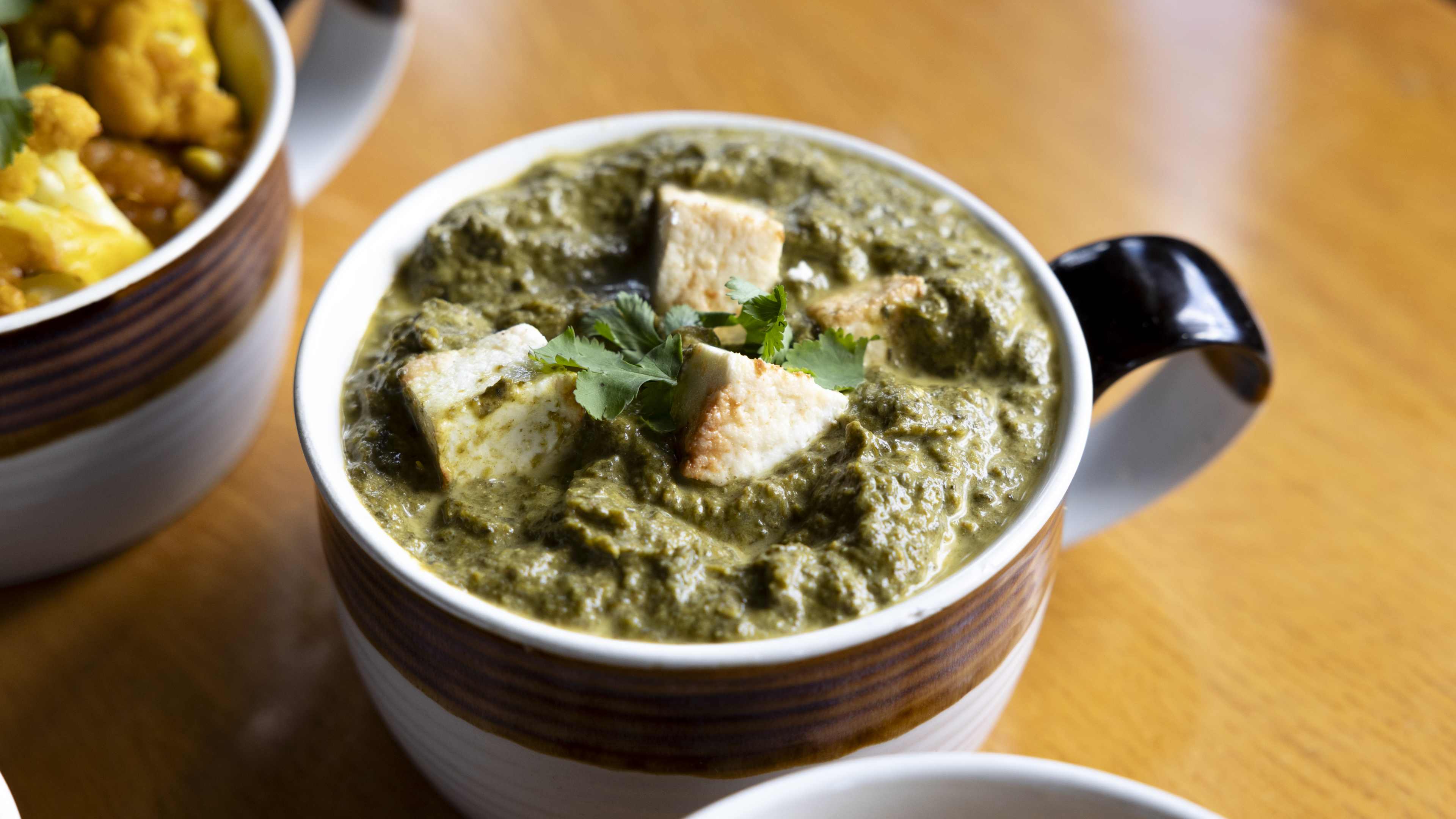 Mug full of saag paneer