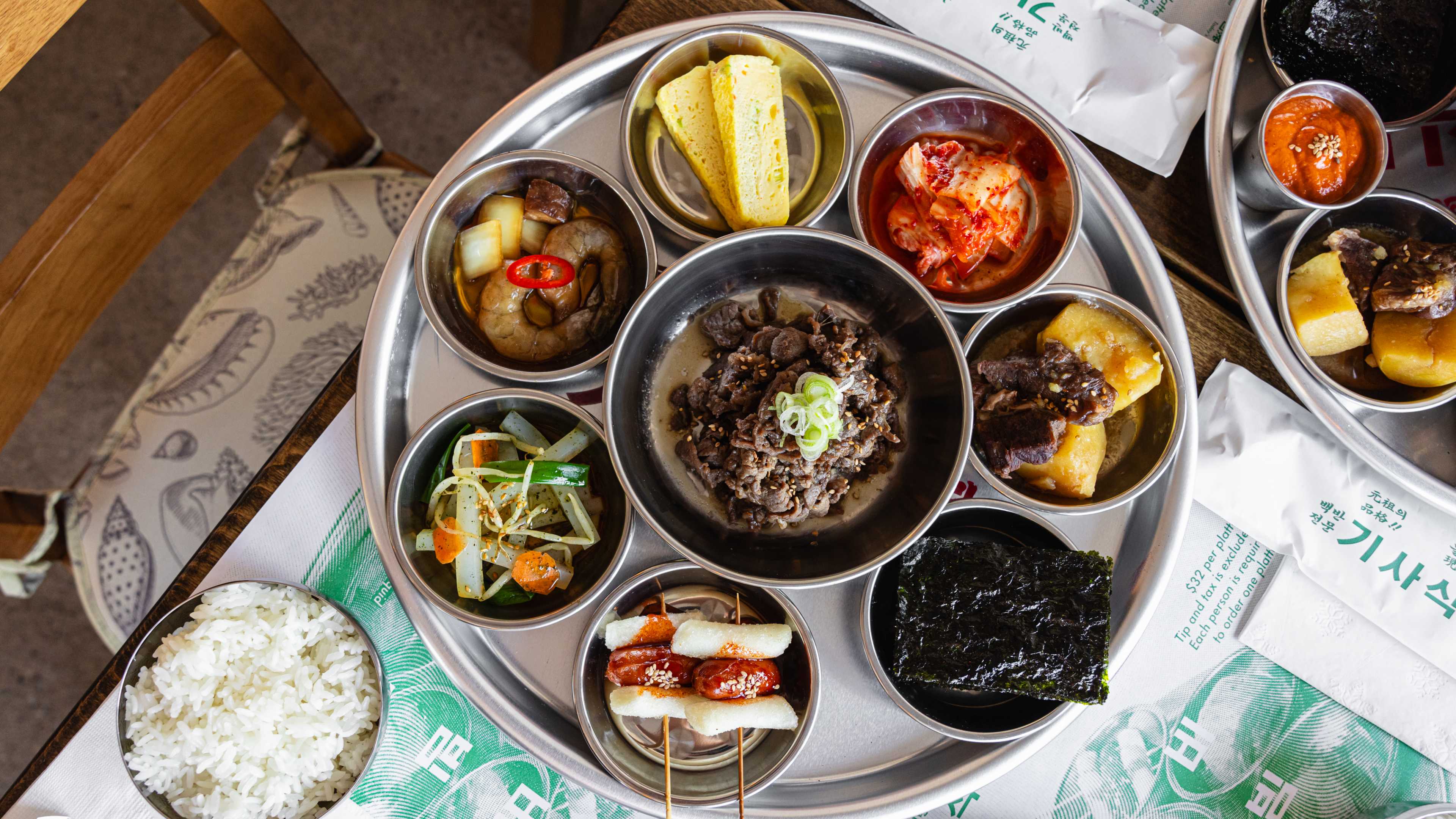 A big platter of Korean food with lots of sides.