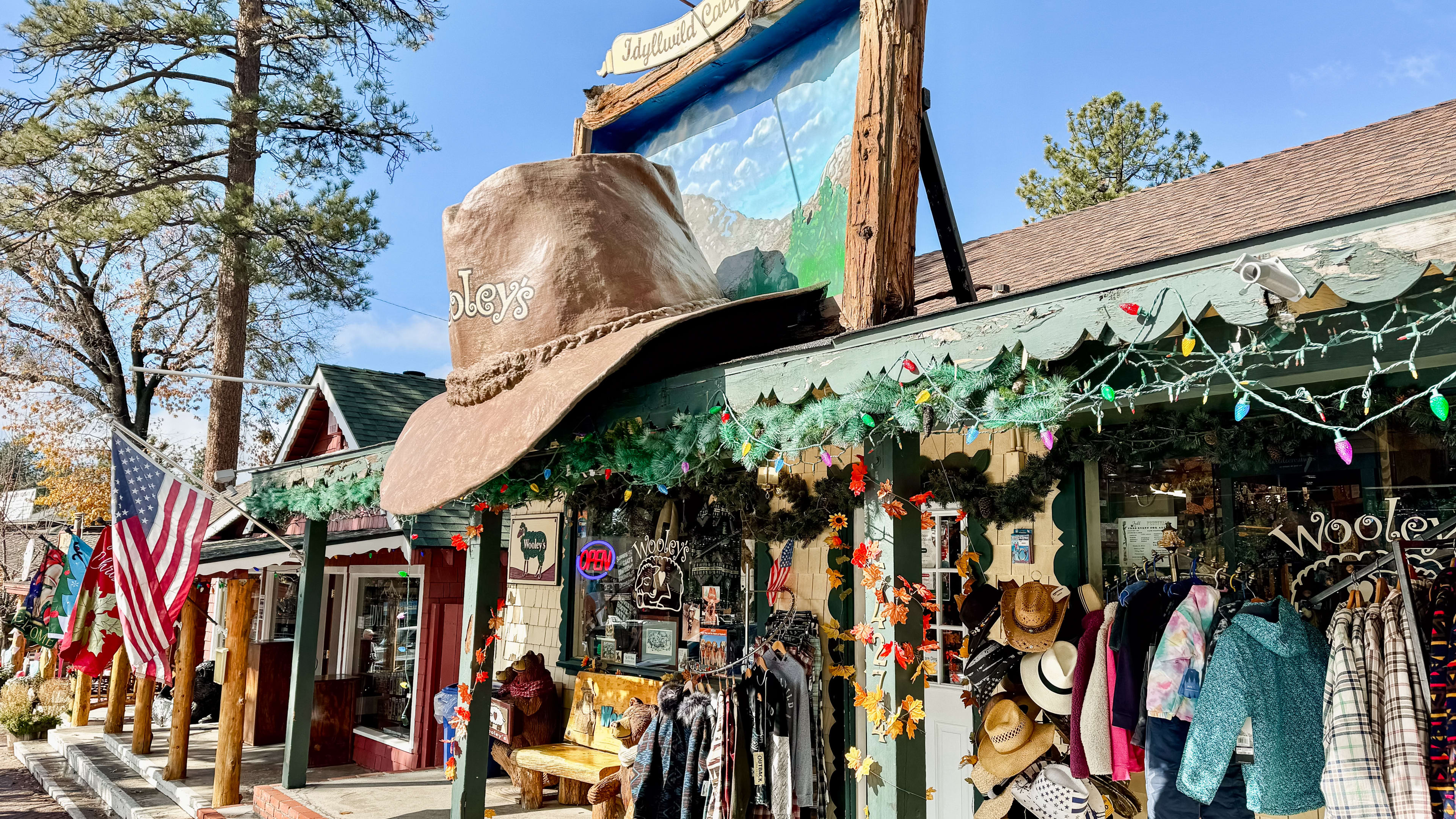 The exterior of Wooley's in Idyllwild. There is large cowboy hat statue on the awning.