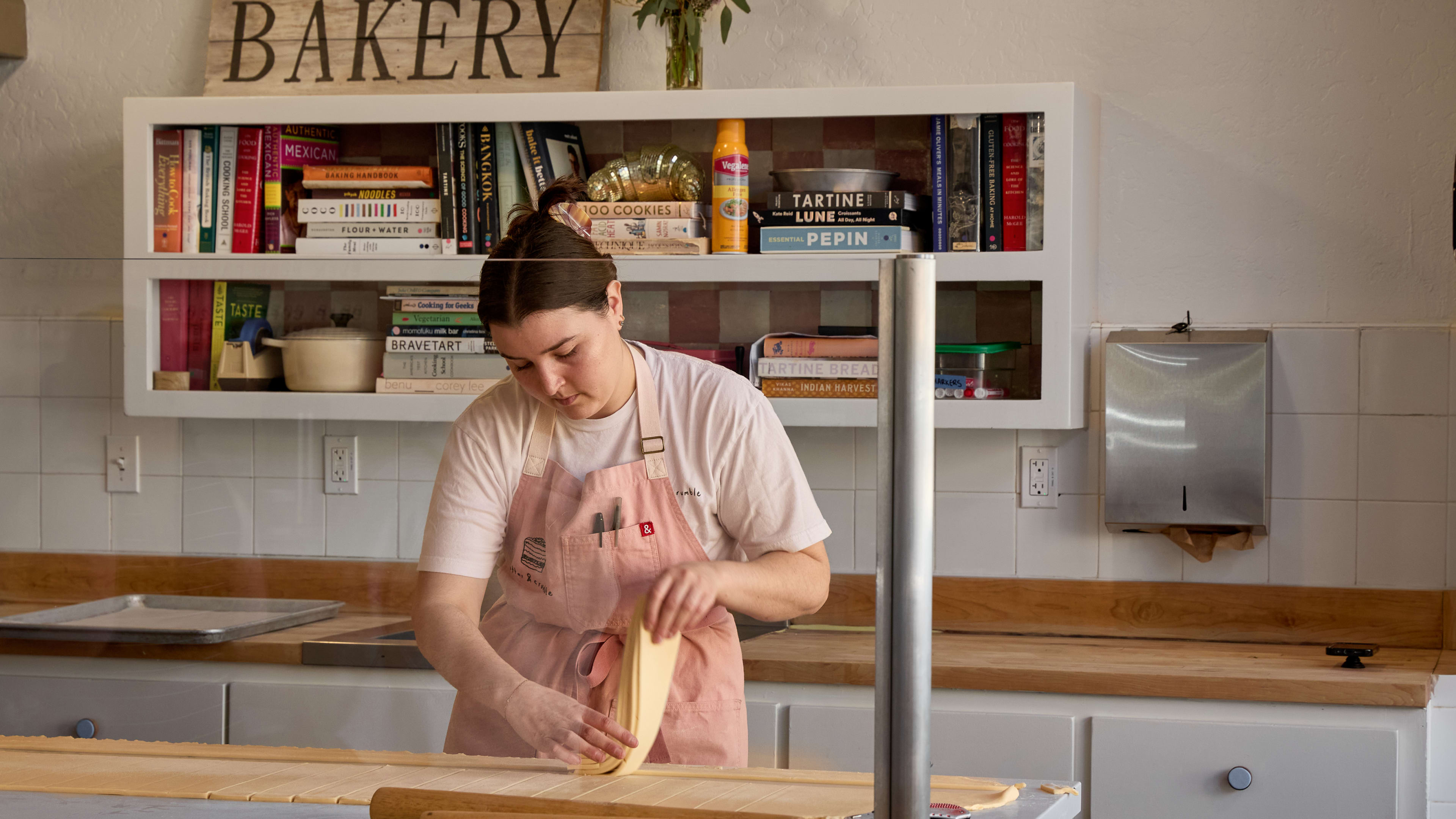 Staff laminating dough at Butter & Crumble