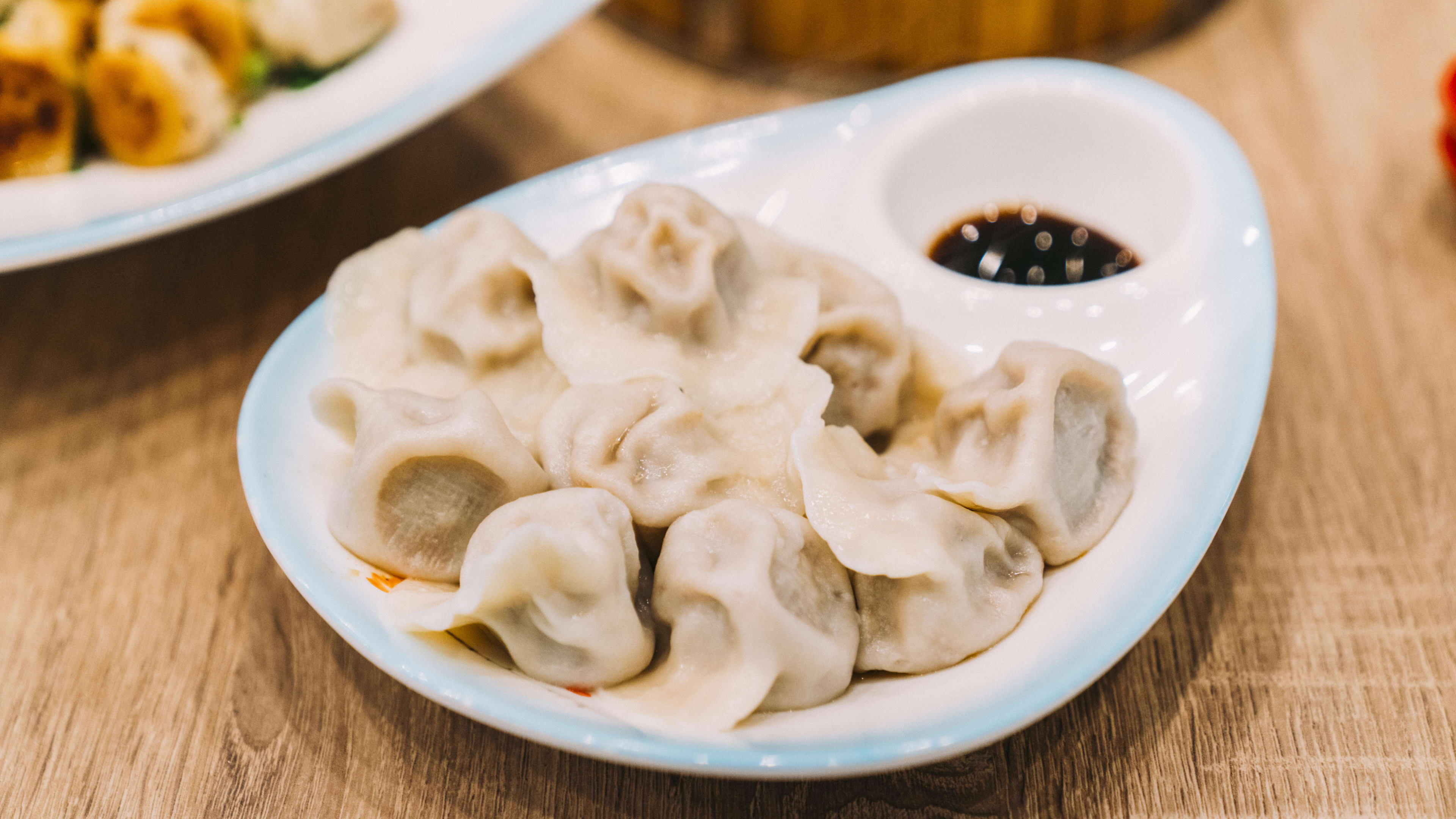 Boiled pork and Napa cabbage dumplings at Mini Potstickers