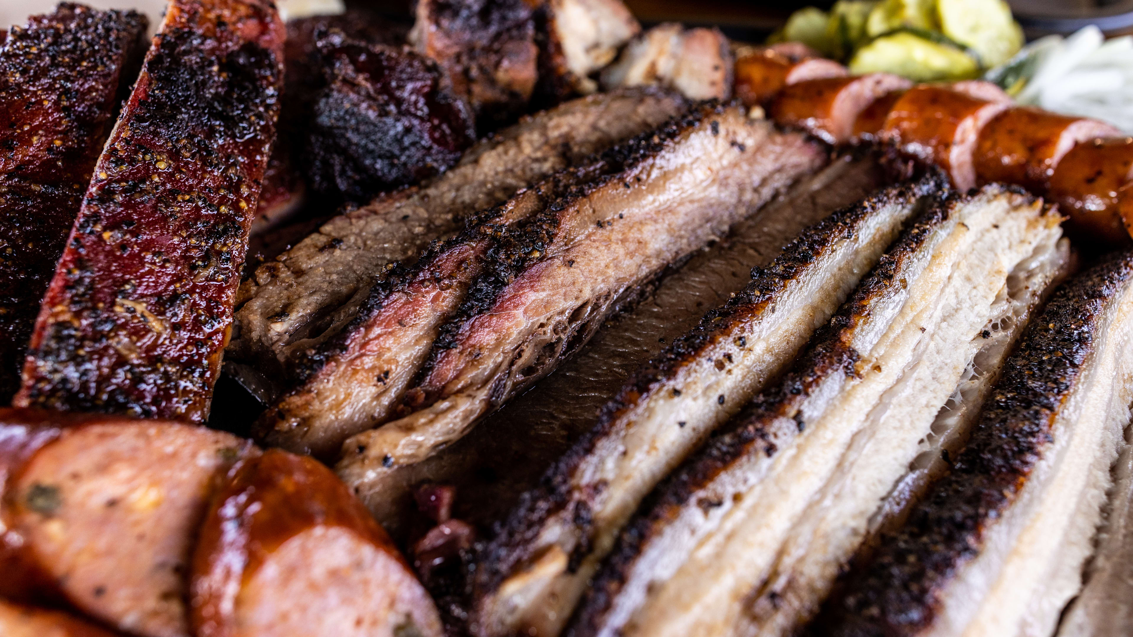 A platter of smoked meats from moreno barbecue.