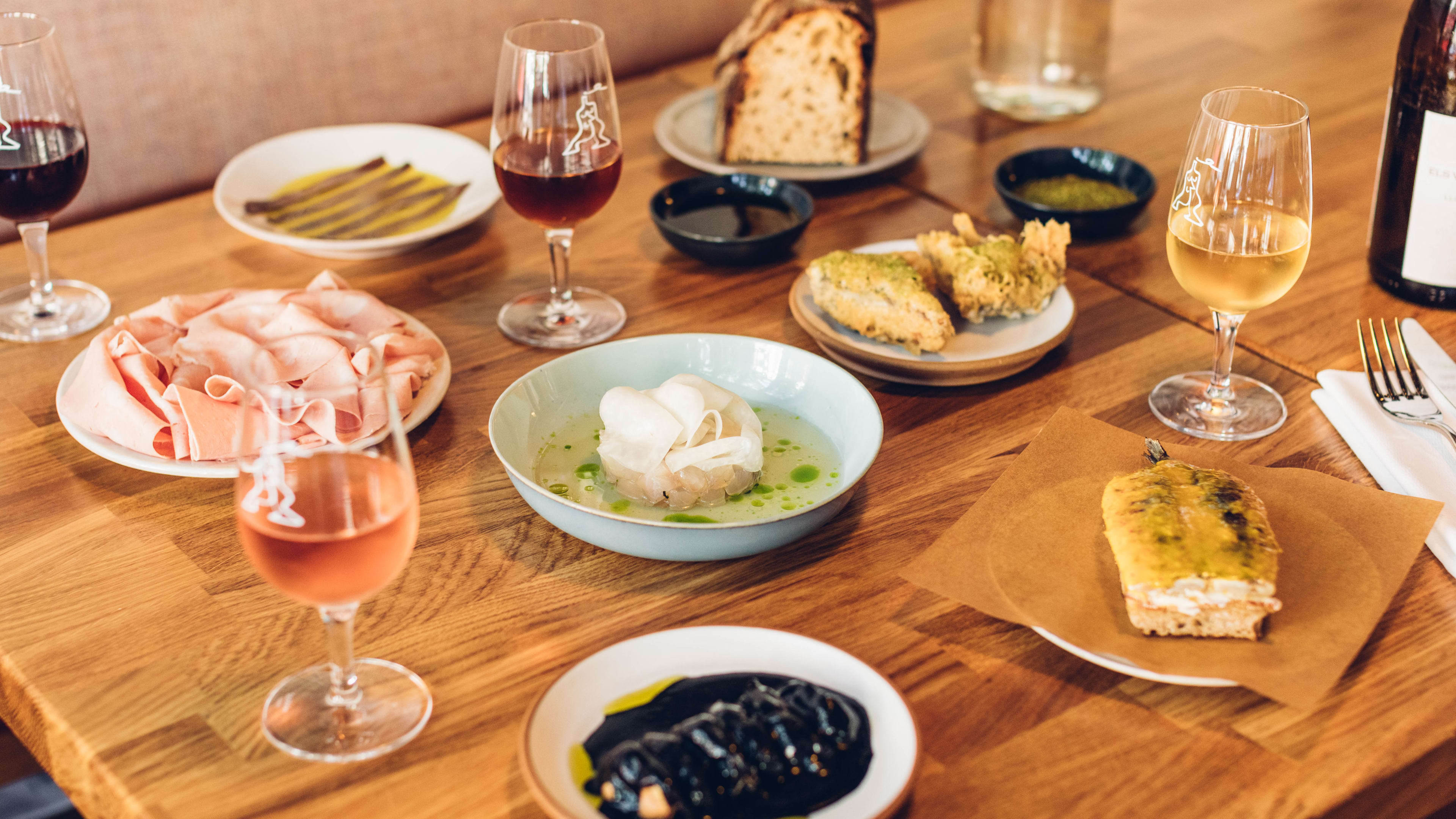 A spread of dishes at Place des Fêtes,