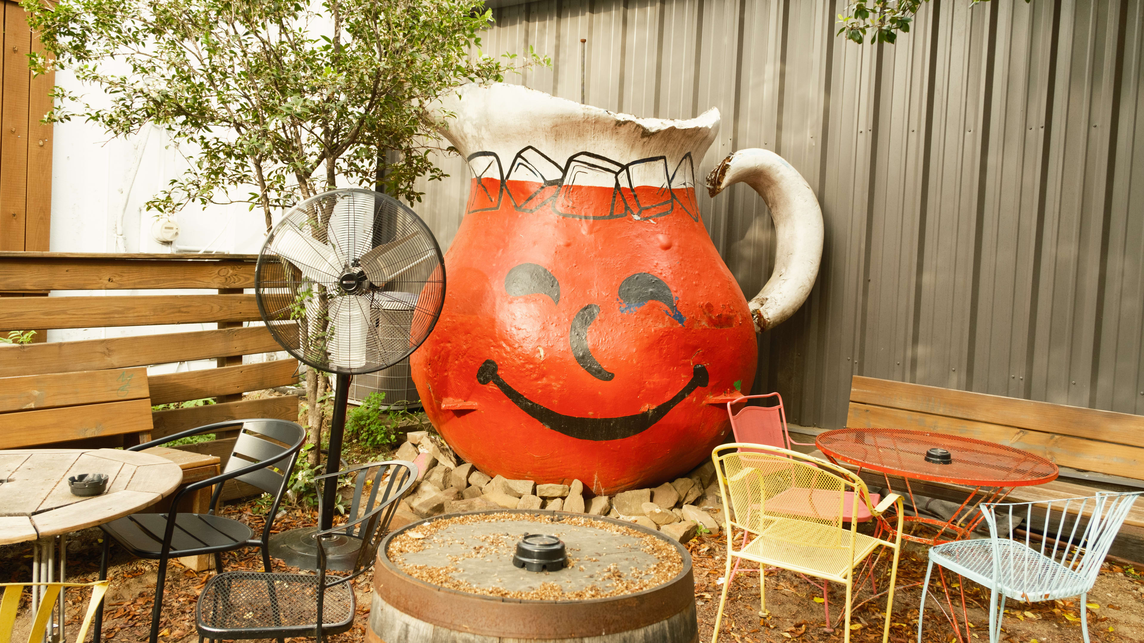 The large Kool-aid Man statue on the patio at Poison Girl.