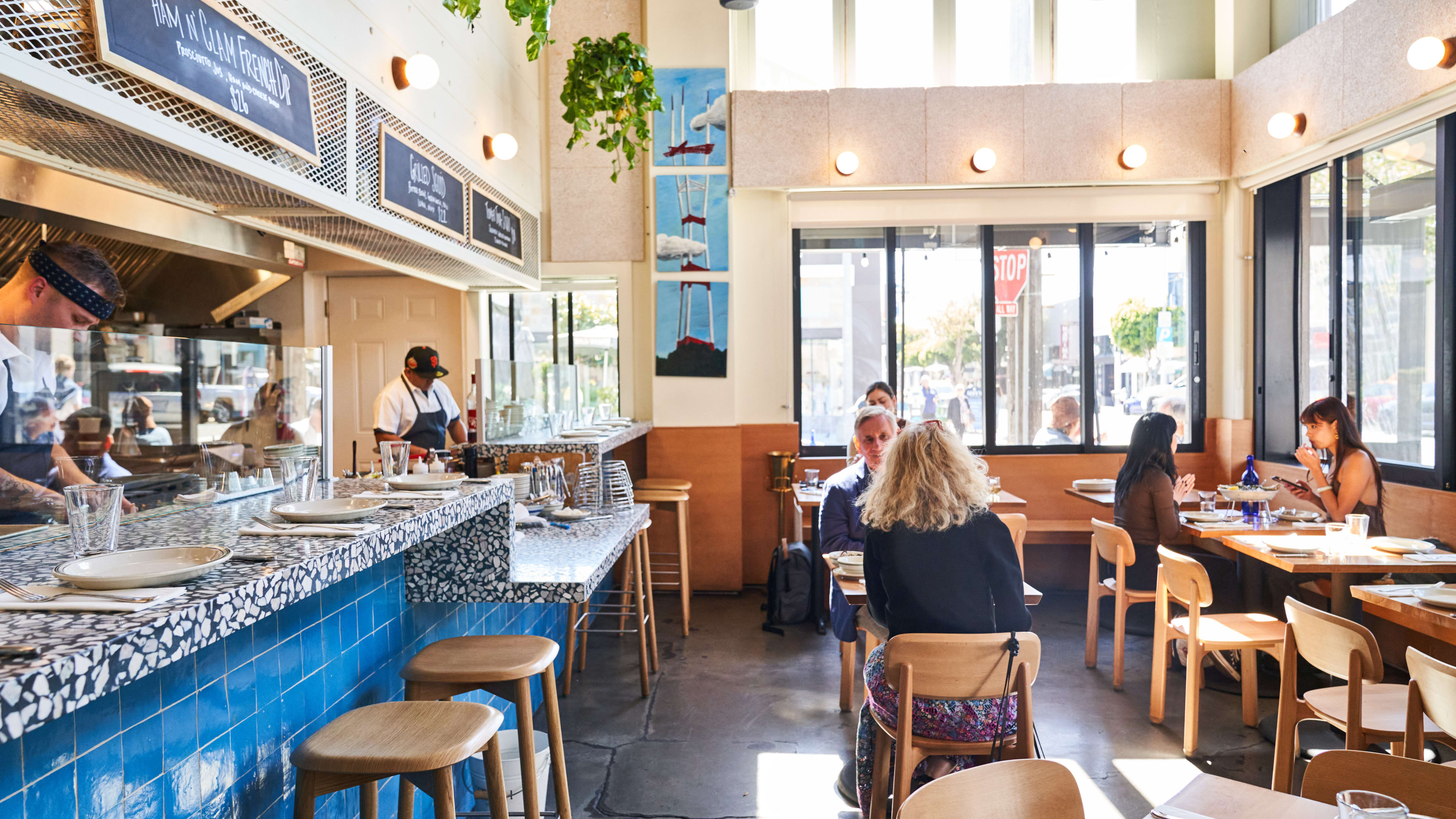 The blue-tiled interior at Popi's Oysterette