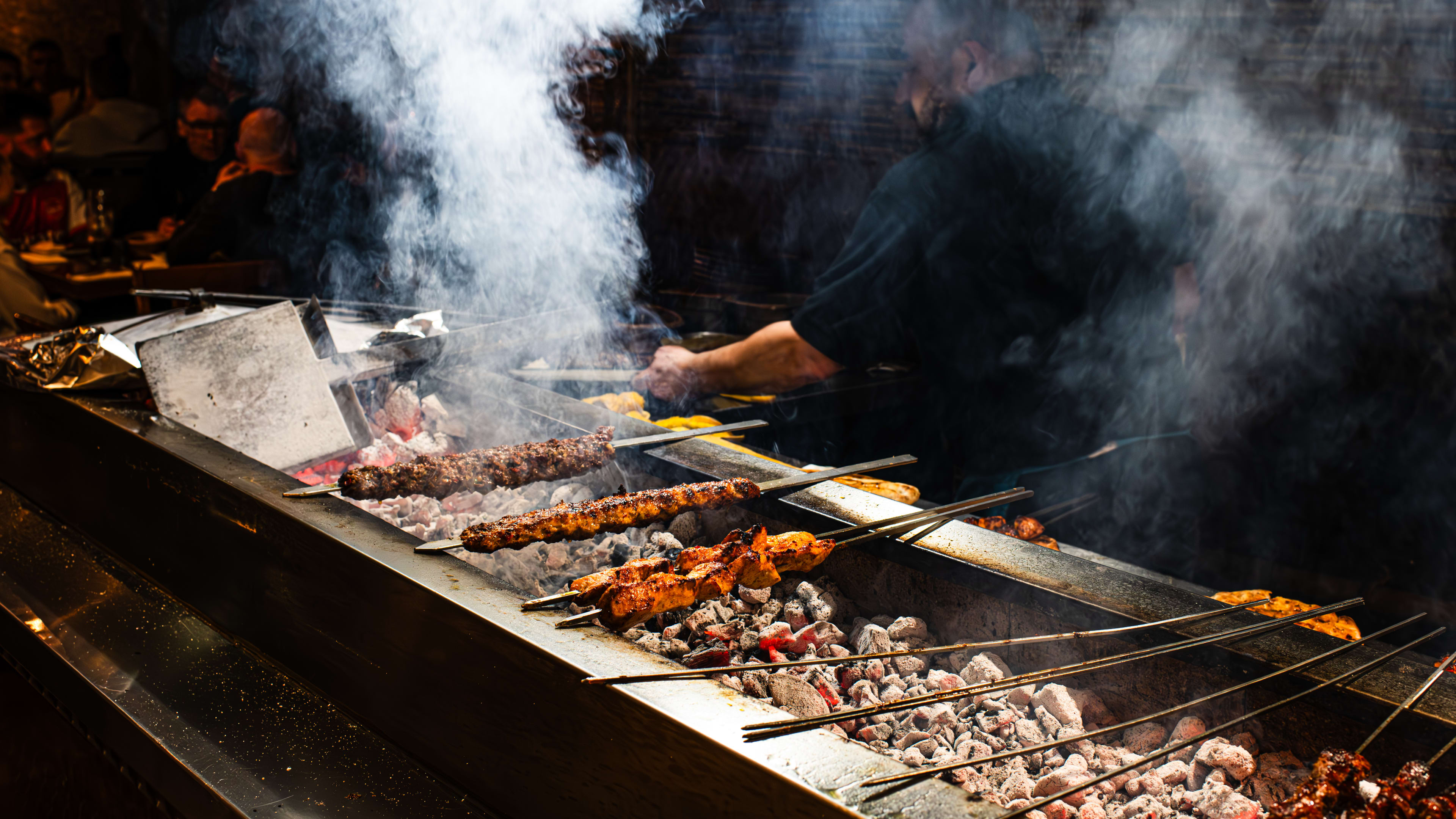 A sizzling ocakbasi grill.