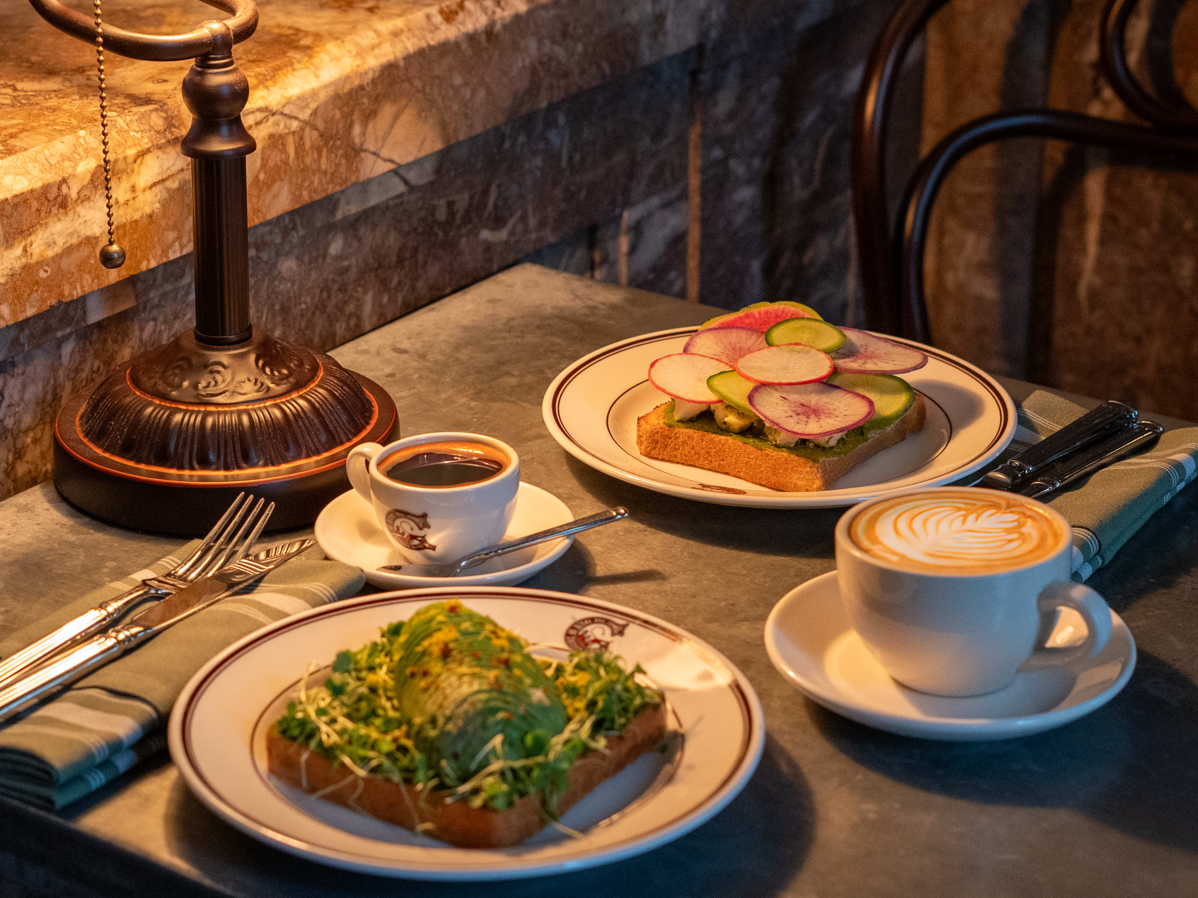 avocado toast and coffee on a table