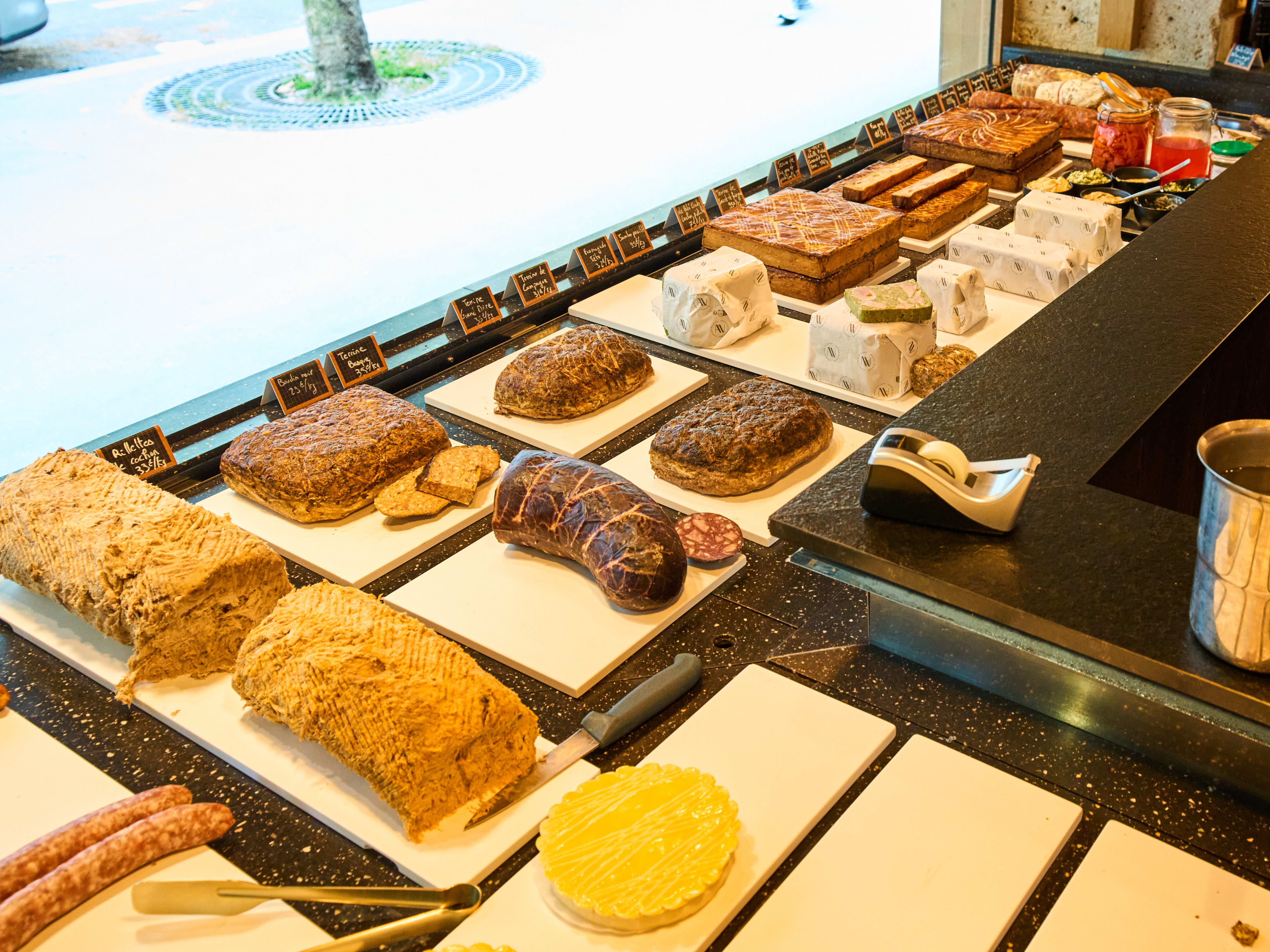 Pastry and baked goods case at Arnaud Nicolas