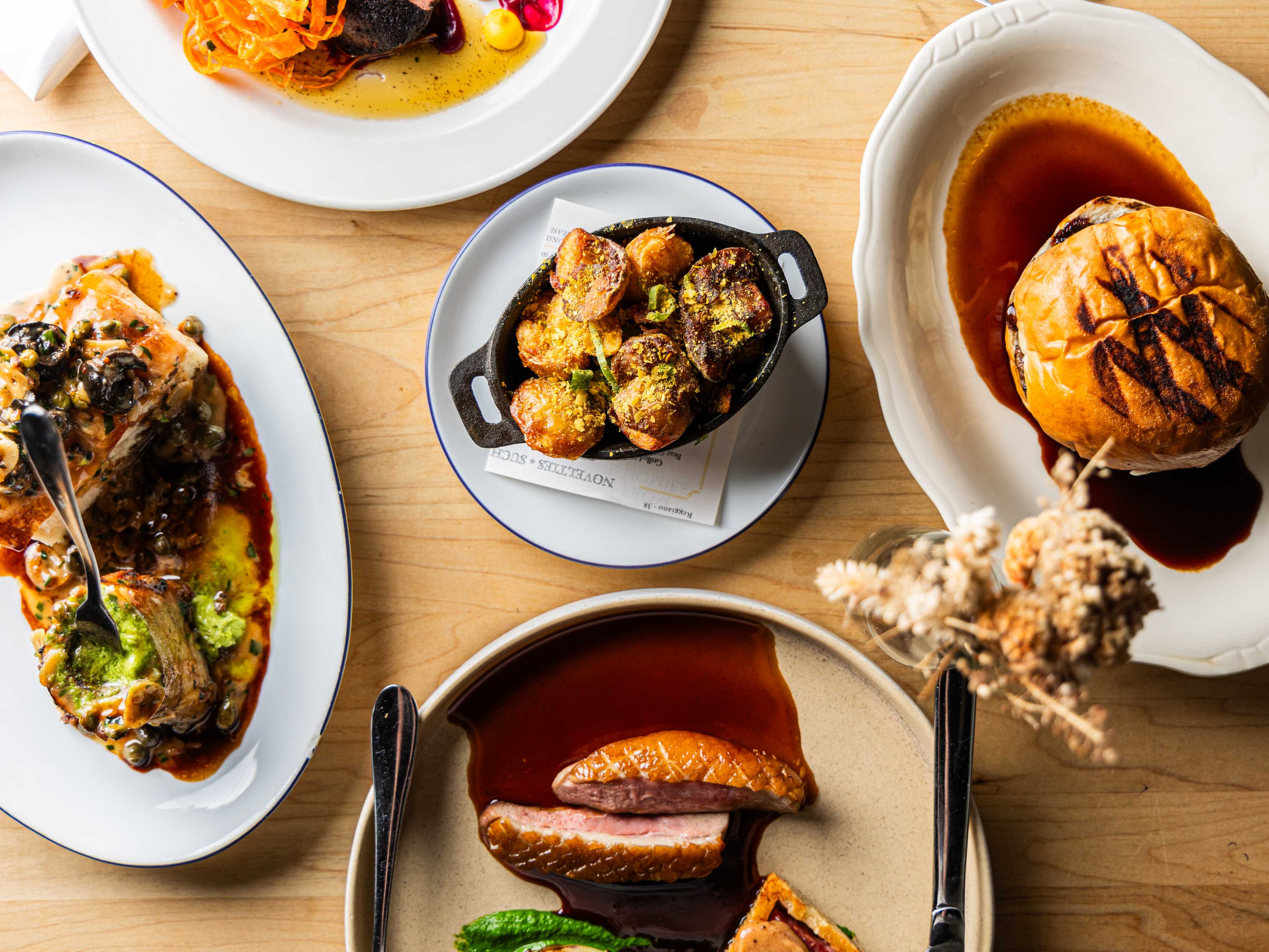Food spread on a wooden table.