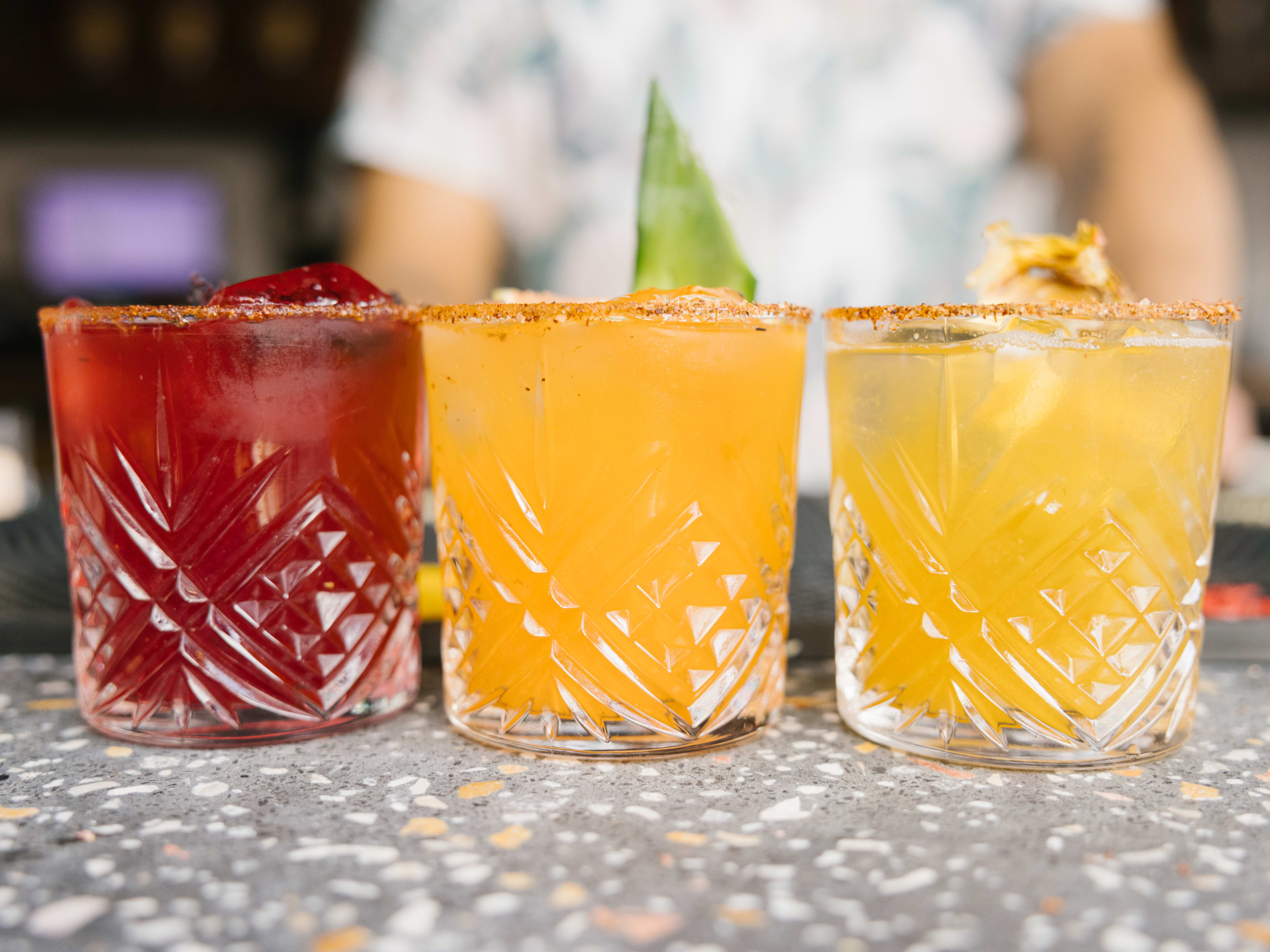 Trio of multi-colored cocktails at Biergarten