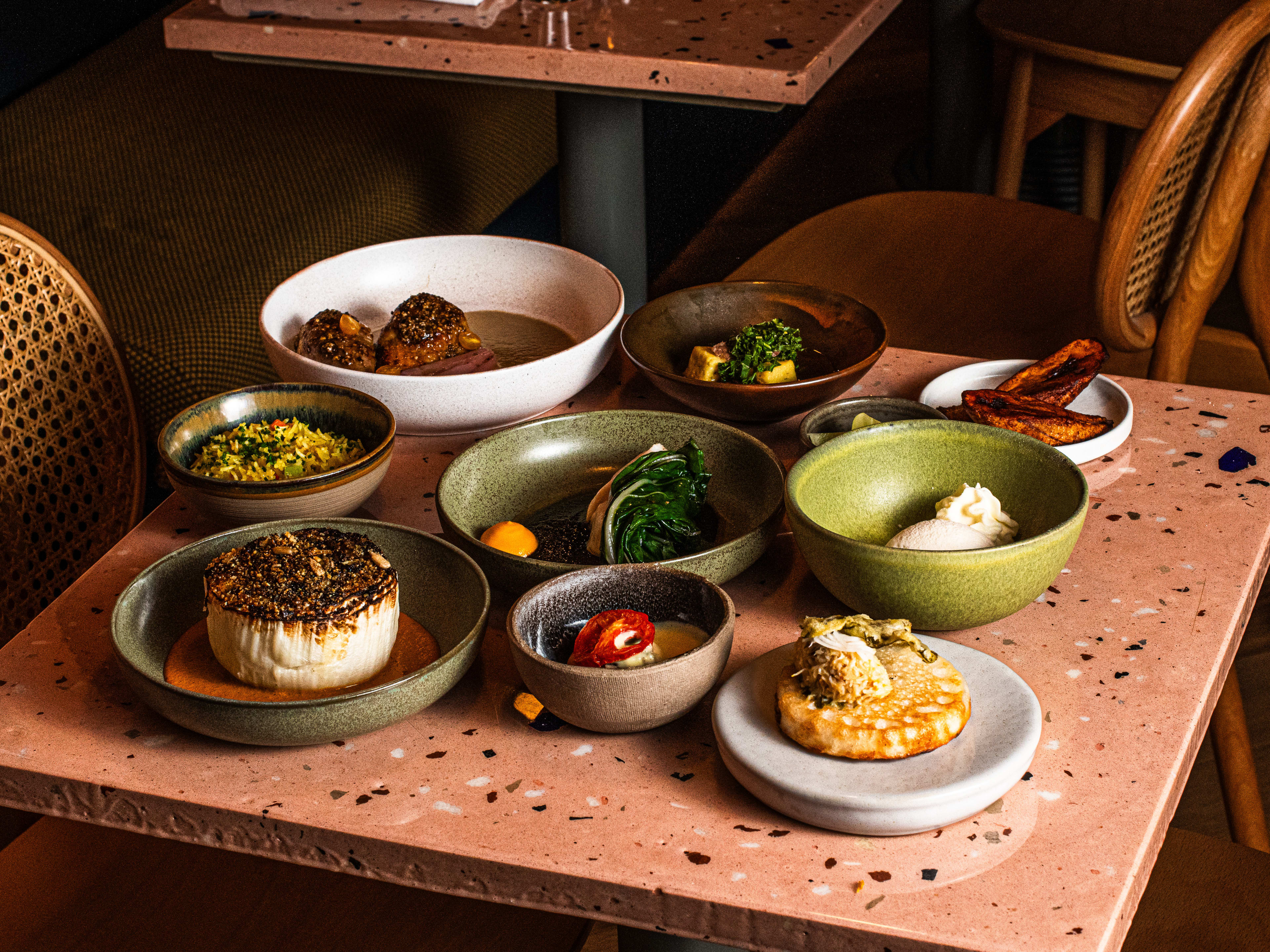 A spread of dishes on a table at Chishuru.