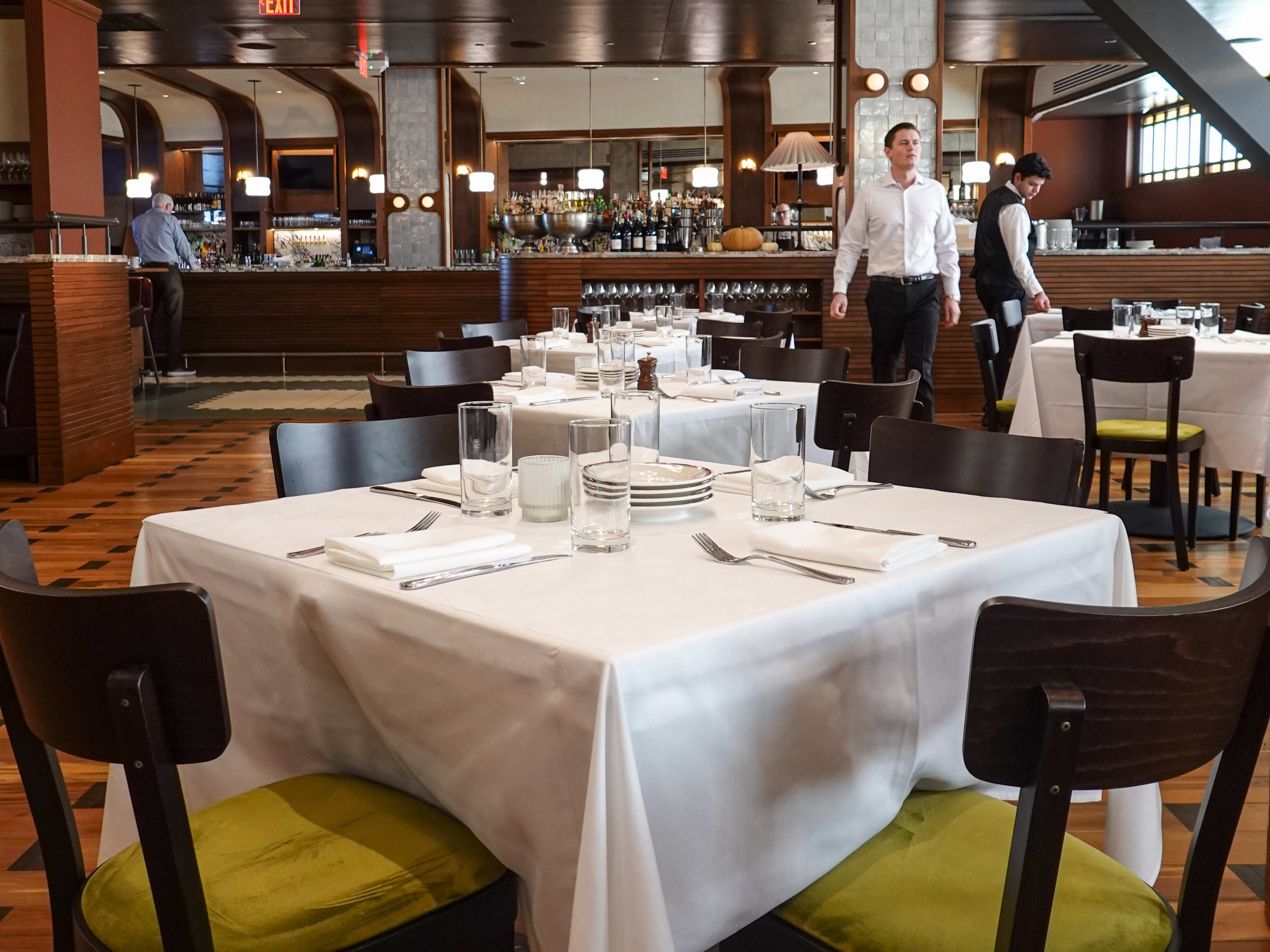 Set table before dinner service at Eastern Standard