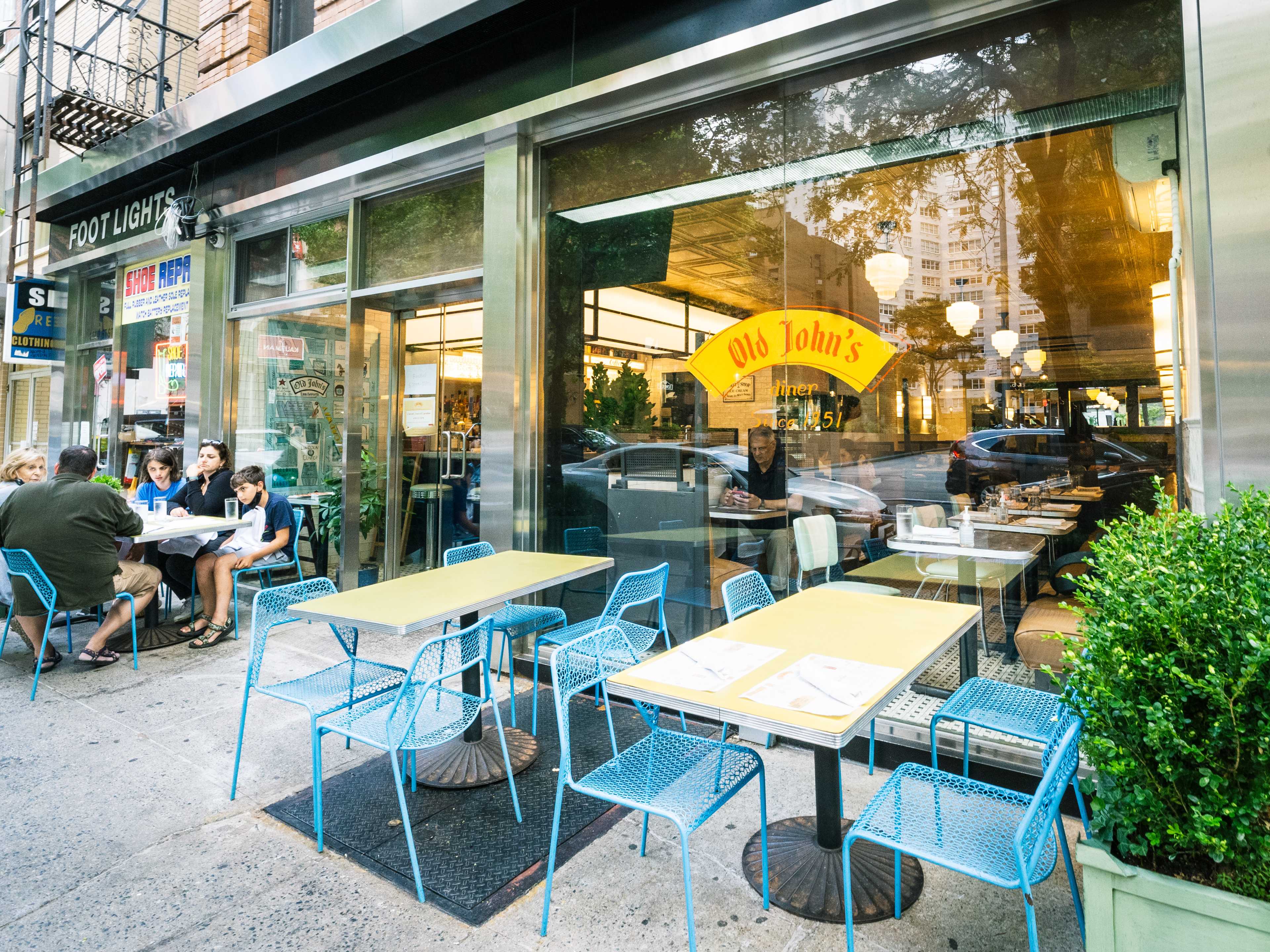 exterior sidewalk tables at old john's diner