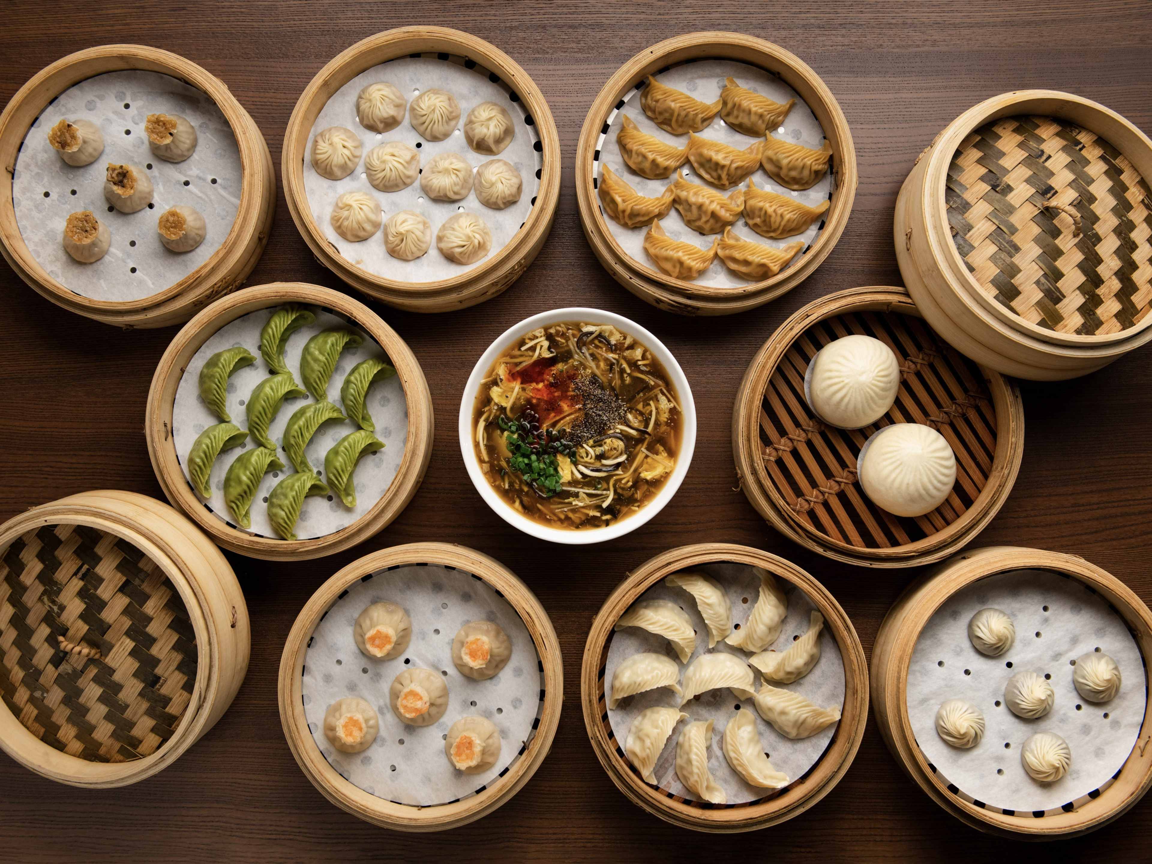 Various steamer baskets of dumplings and buns