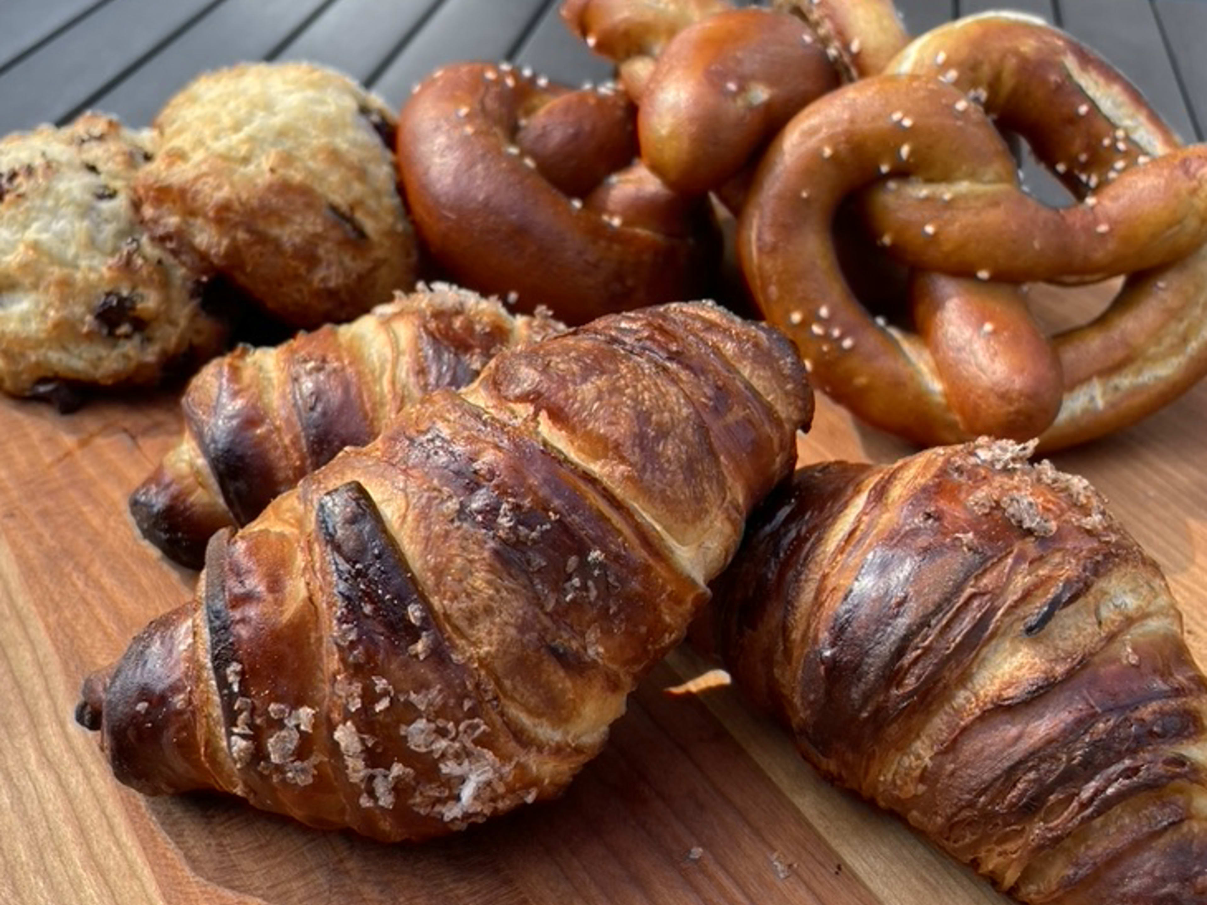 mix of pastries from E. Holland Sundries on a wooden cutting board